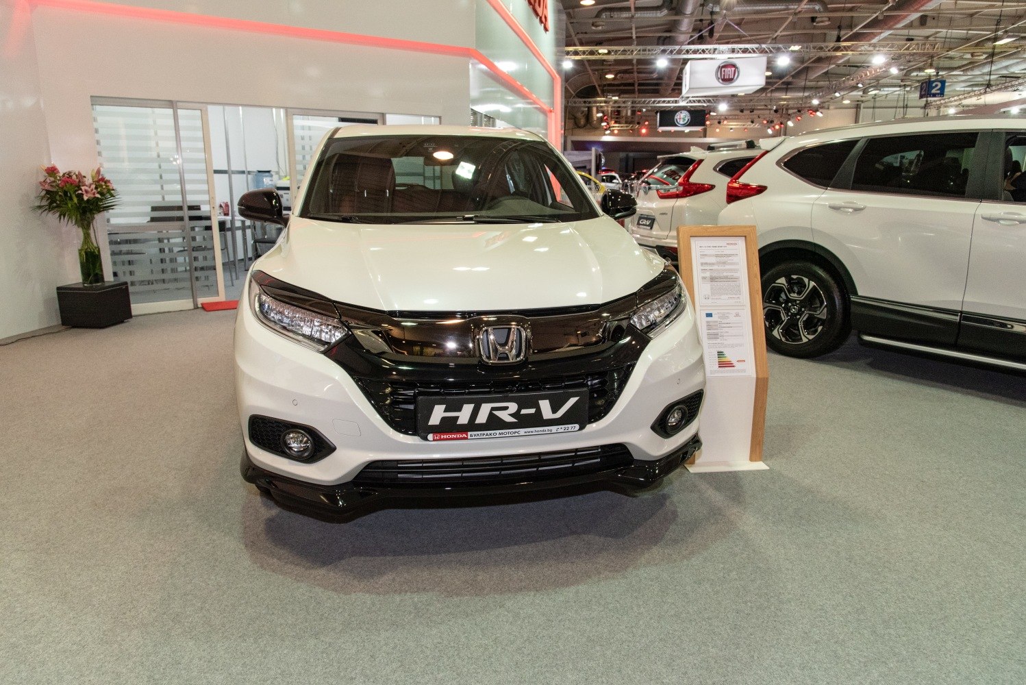 Front view with LED headlights and black grille elements