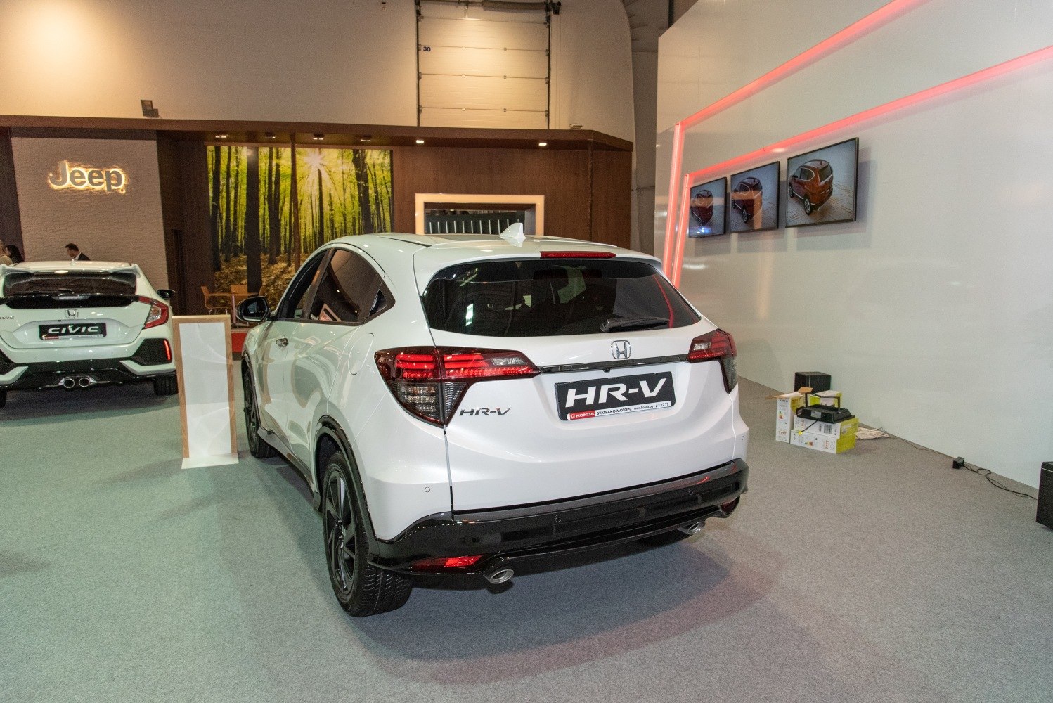 Rear view of a compact SUV highlighting dynamic tail lights and sporty bumper.