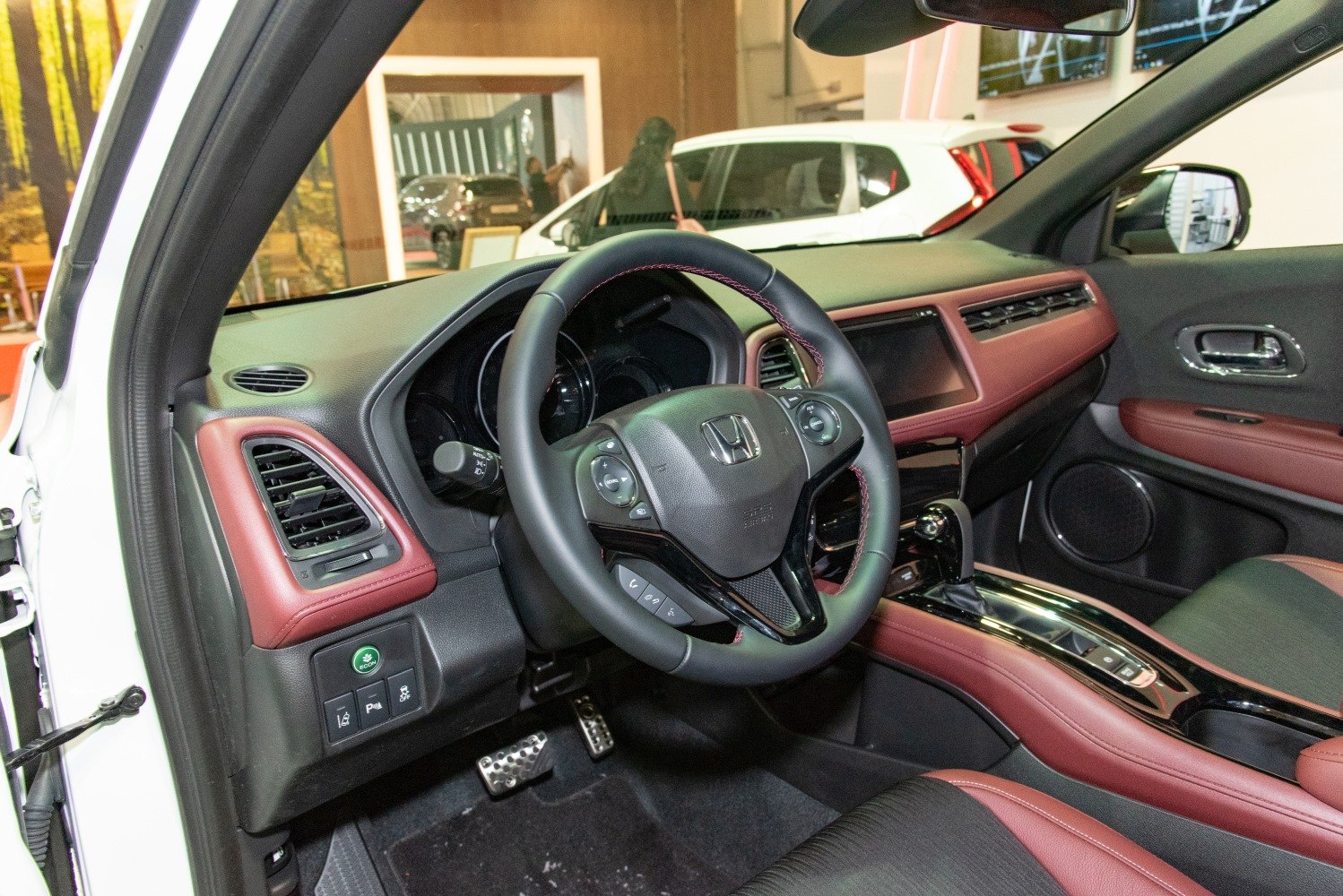 Steering wheel and dashboard interior elements in modern car