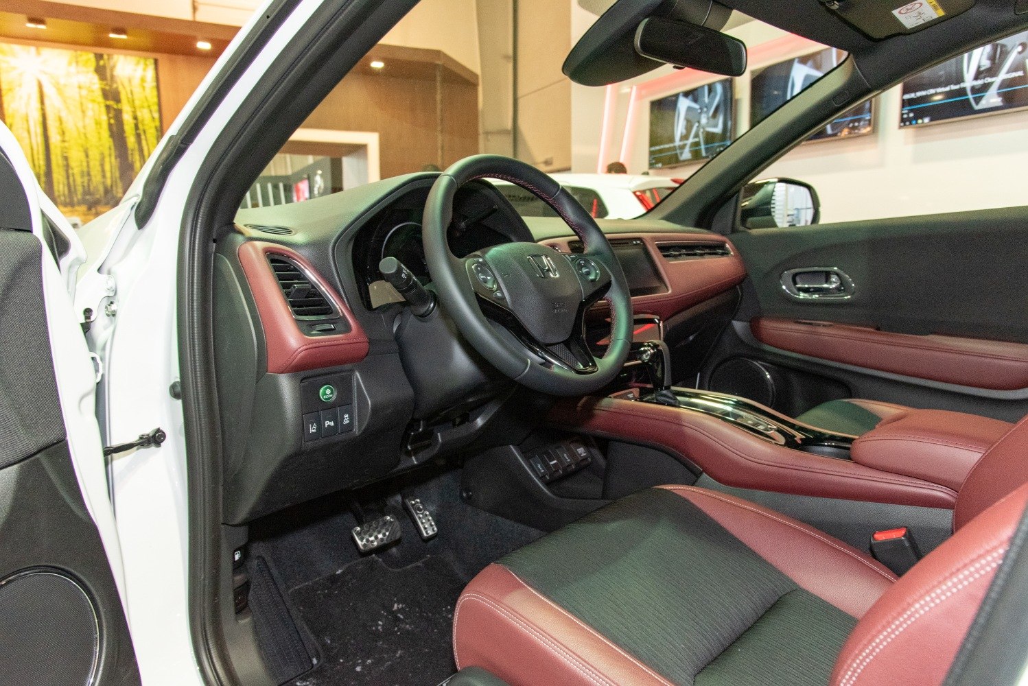 Dashboard and steering wheel with red leather upholstery