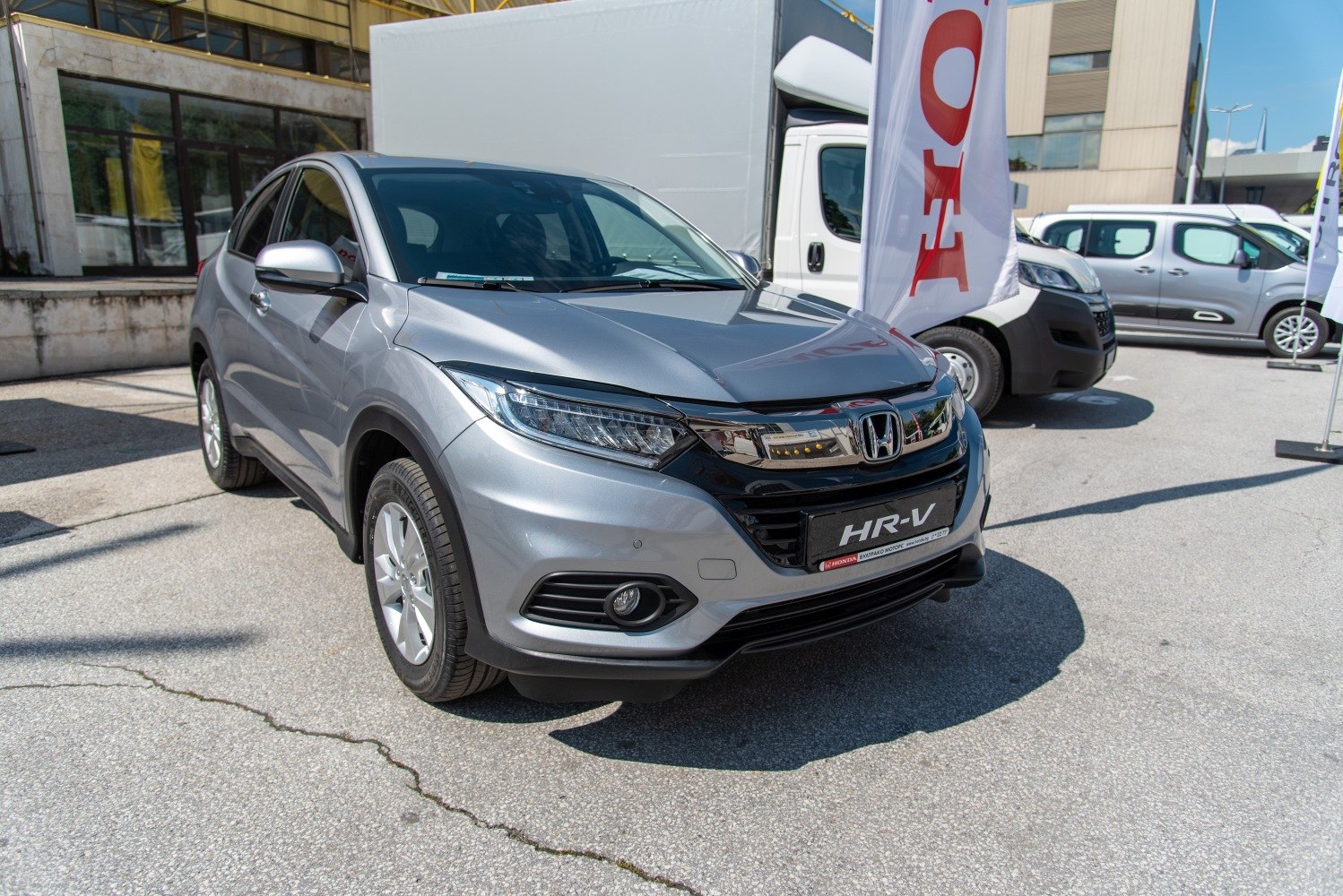Front view with LED headlights and prominent grille