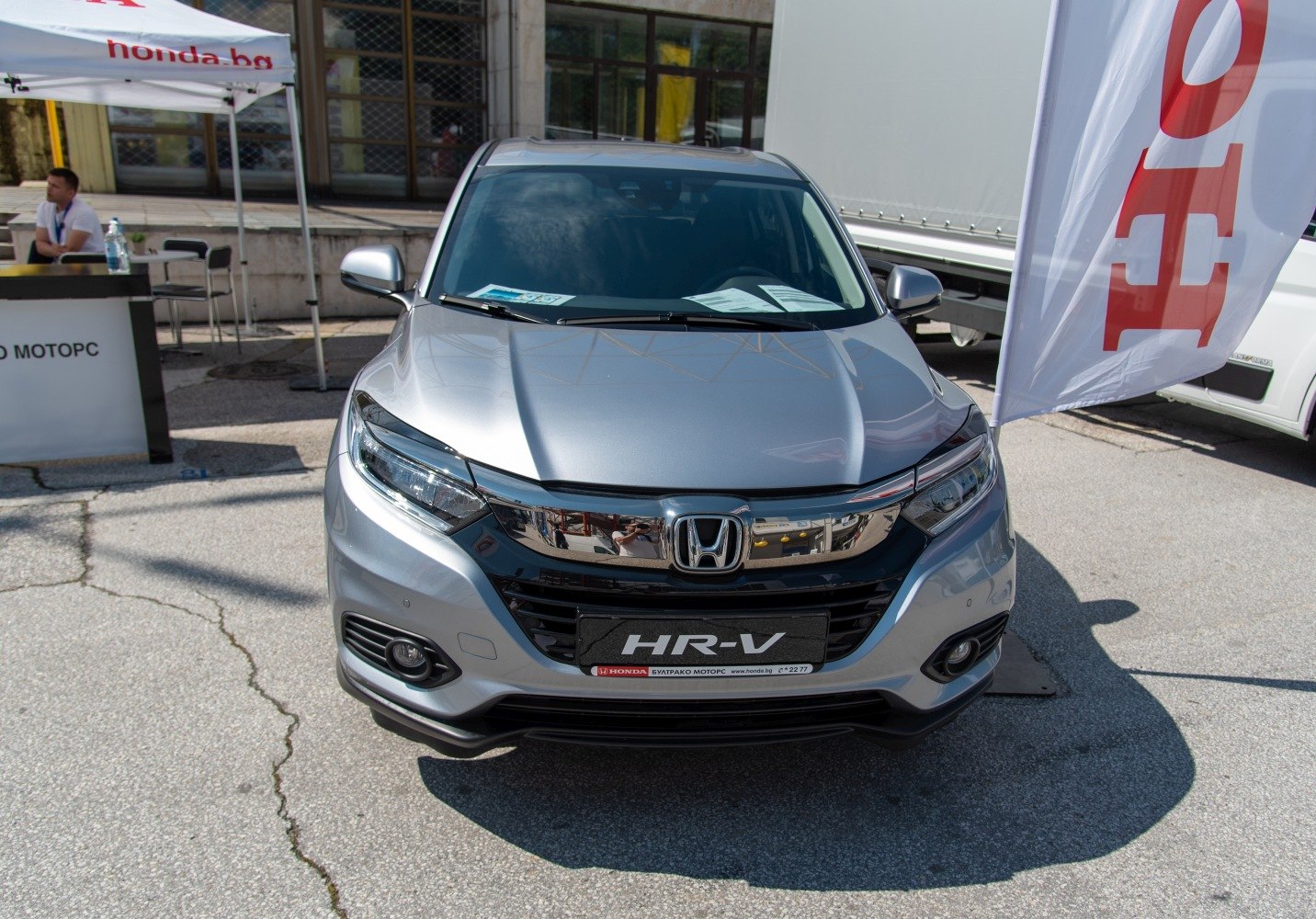 Front view of a compact SUV with modern headlights and prominent grille