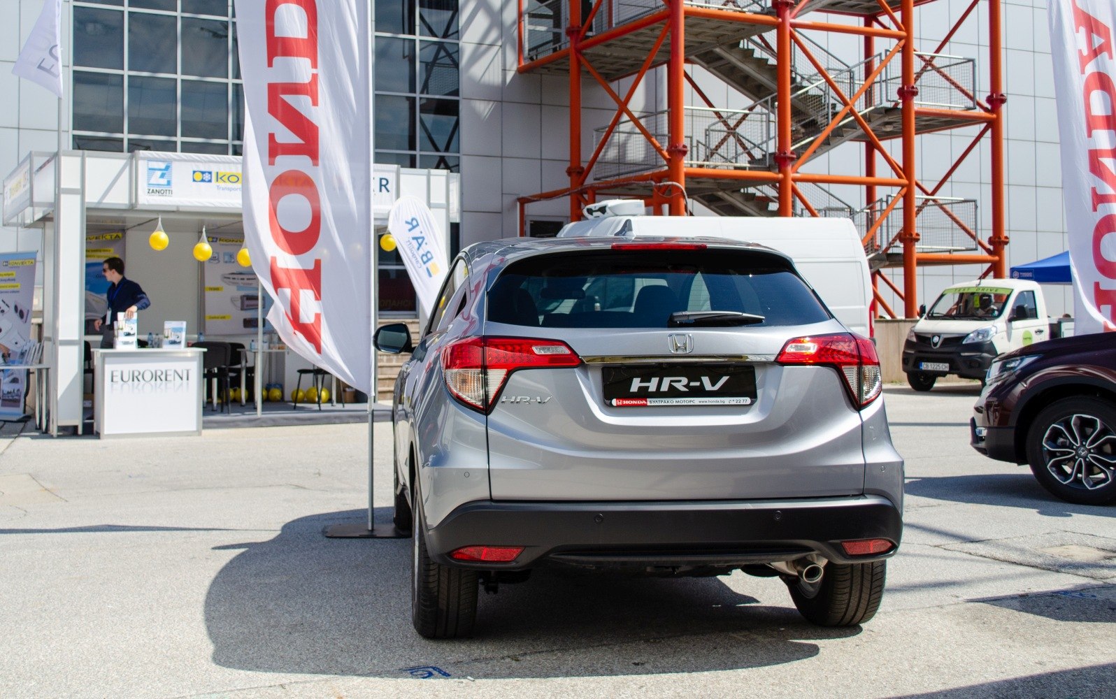 Rear view showing distinctive taillights and rear design of a facelift SUV