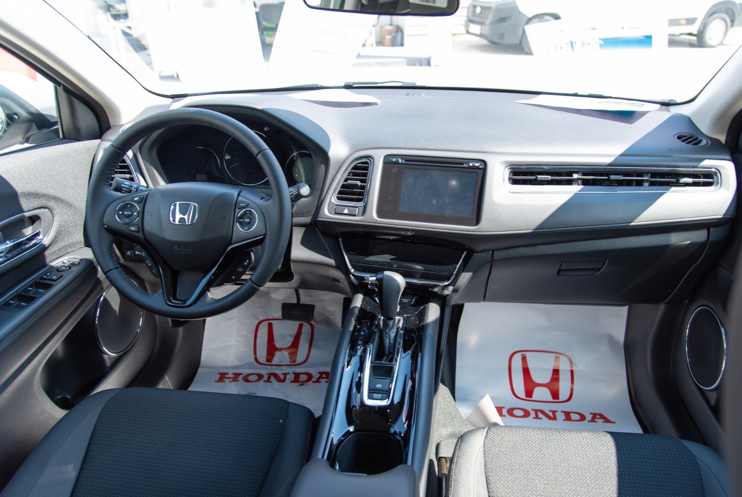 Dashboard and center console with touchscreen and gear shift