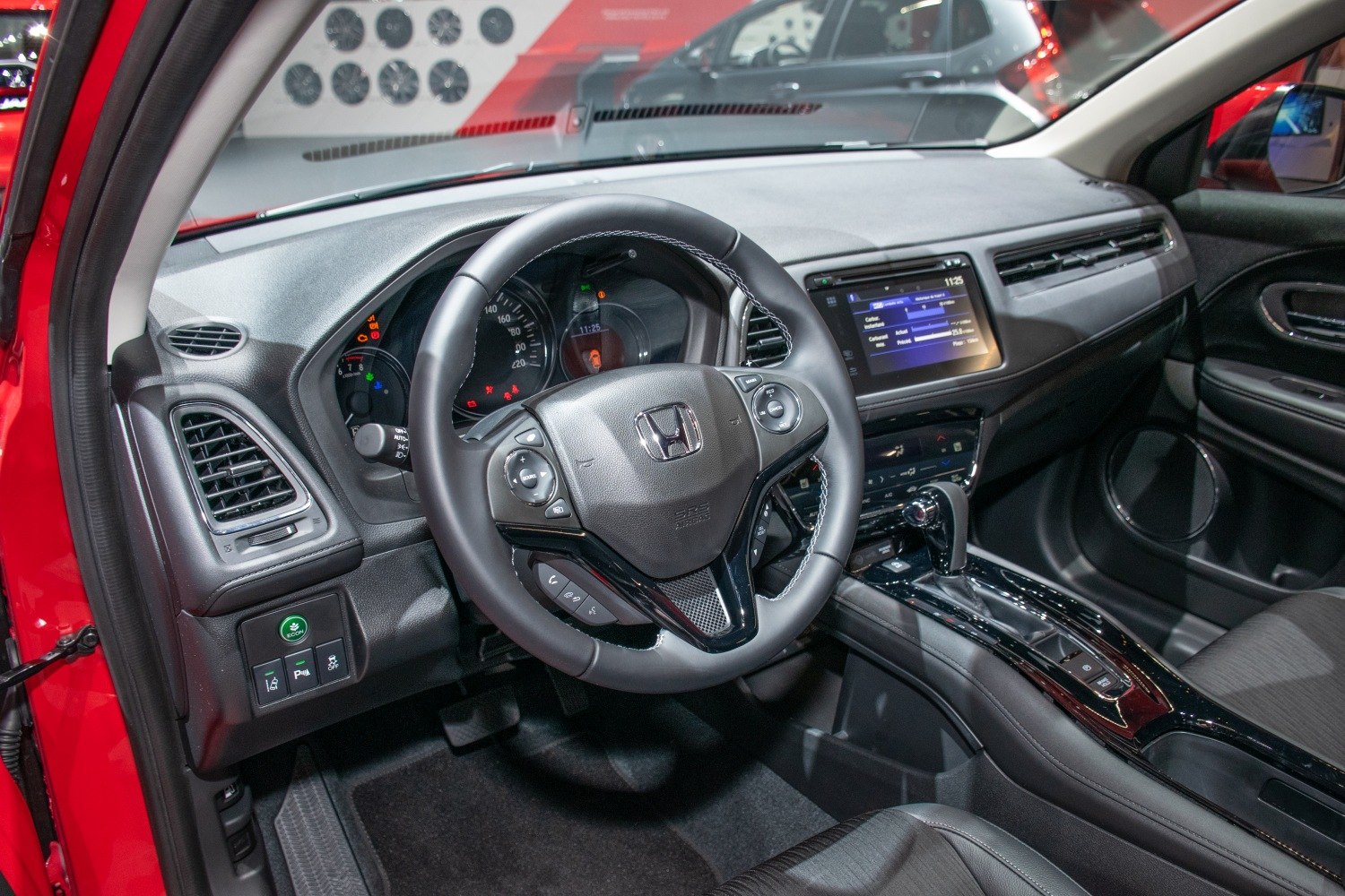 Multifunction steering wheel, digital dashboard, and central touchscreen infotainment system