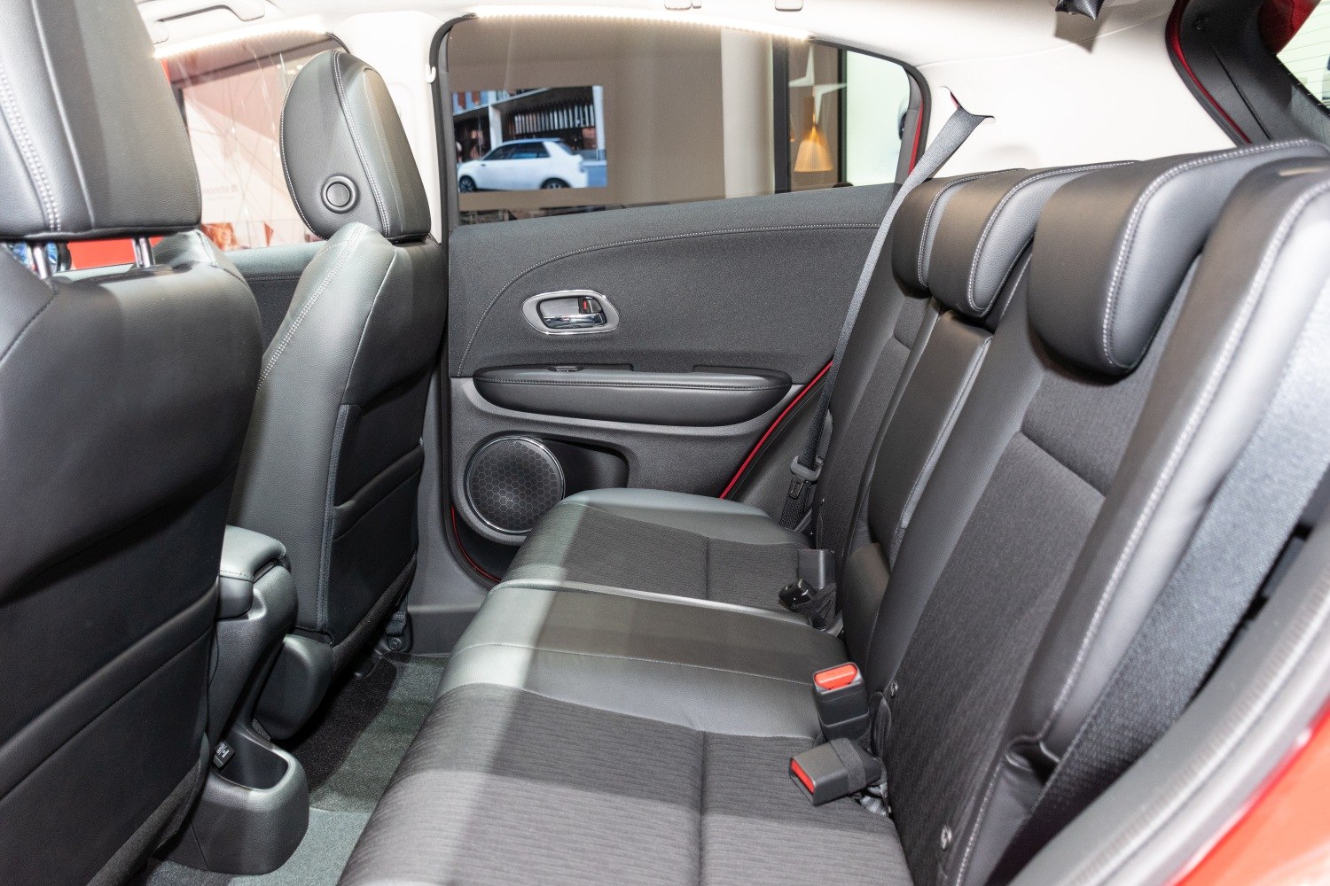 Spacious rear seating with leather upholstery and seat belts