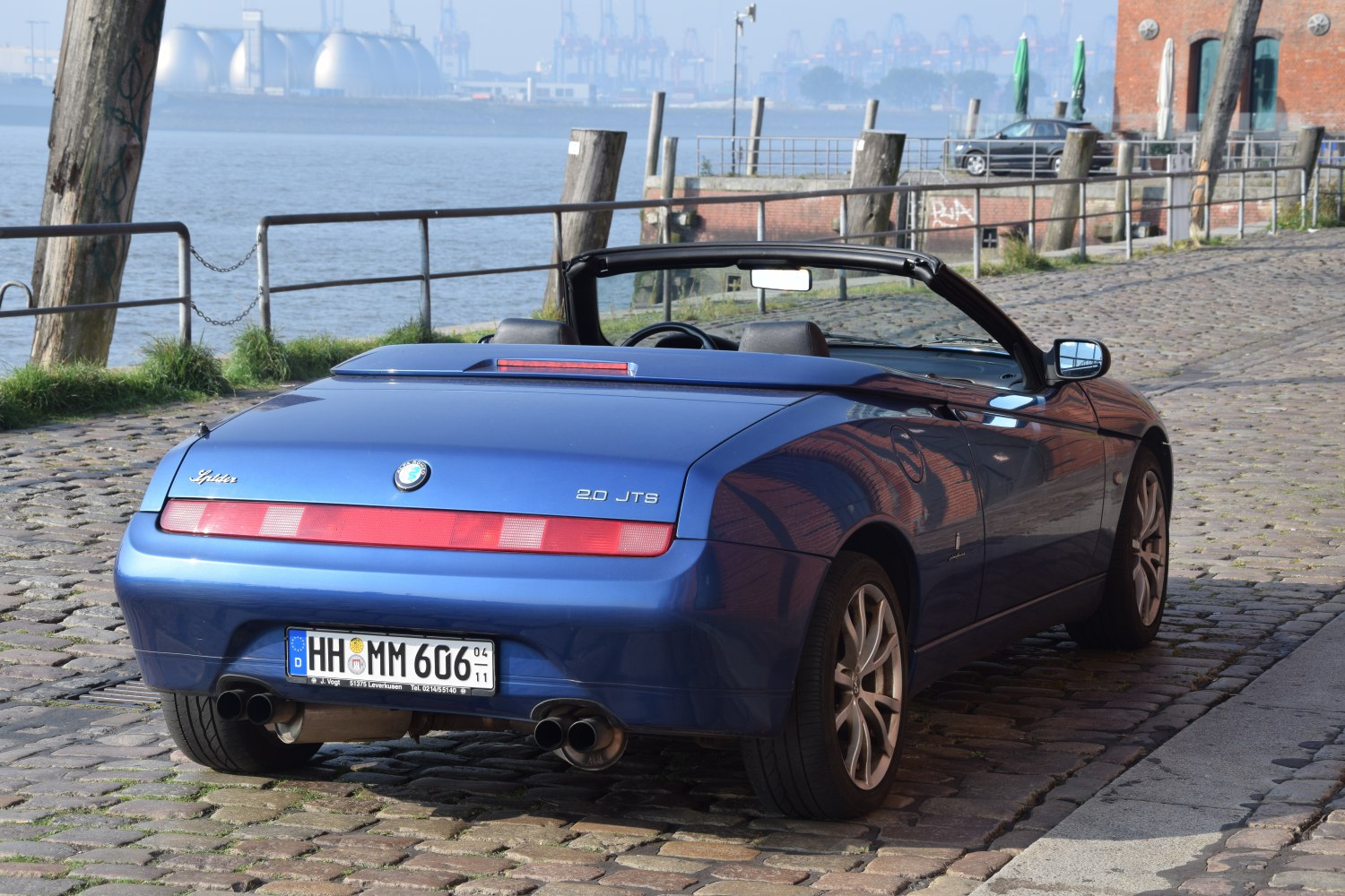 Convertible with rear taillights and dual exhaust pipes