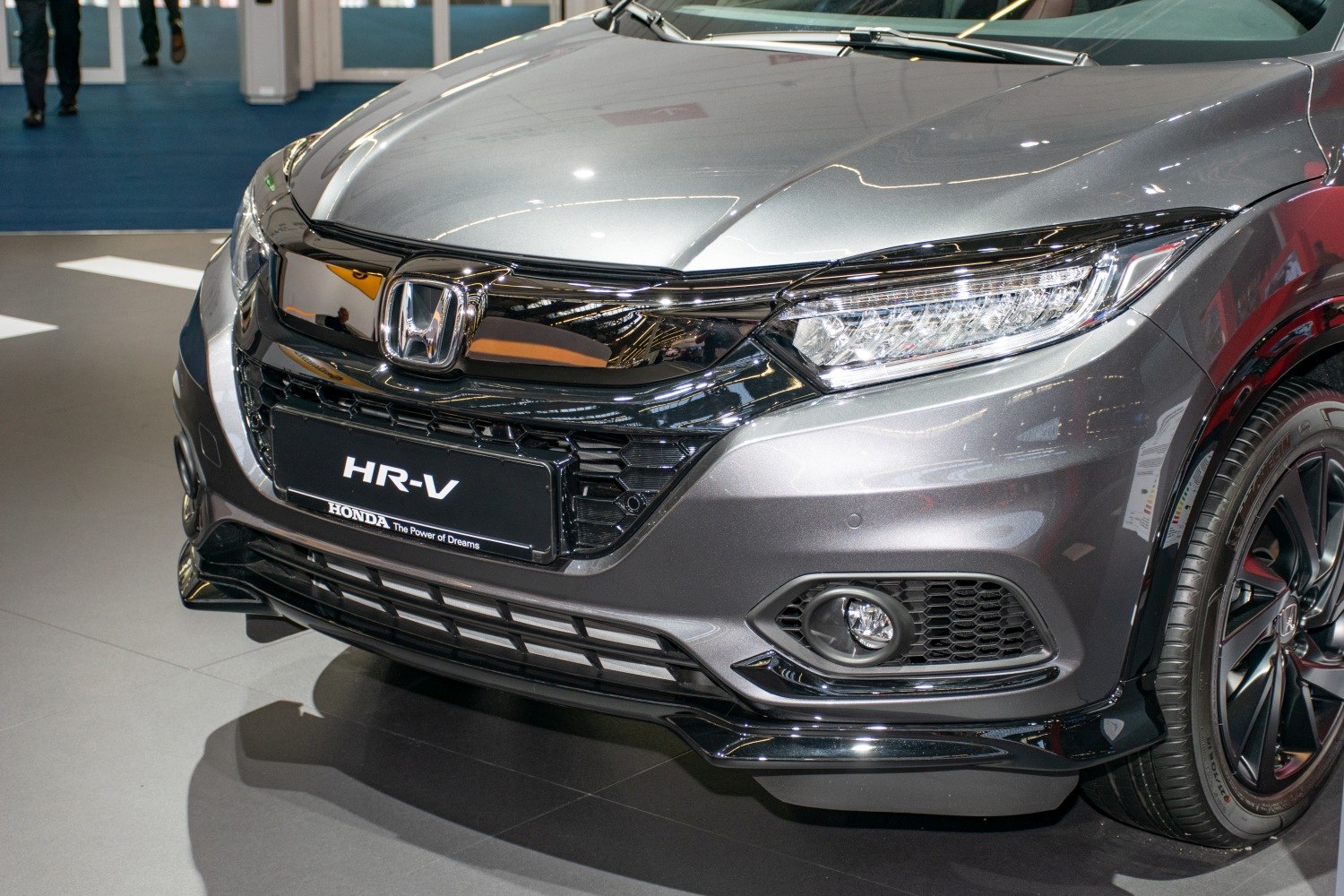 Close-up of front grill, LED headlights, and fog light