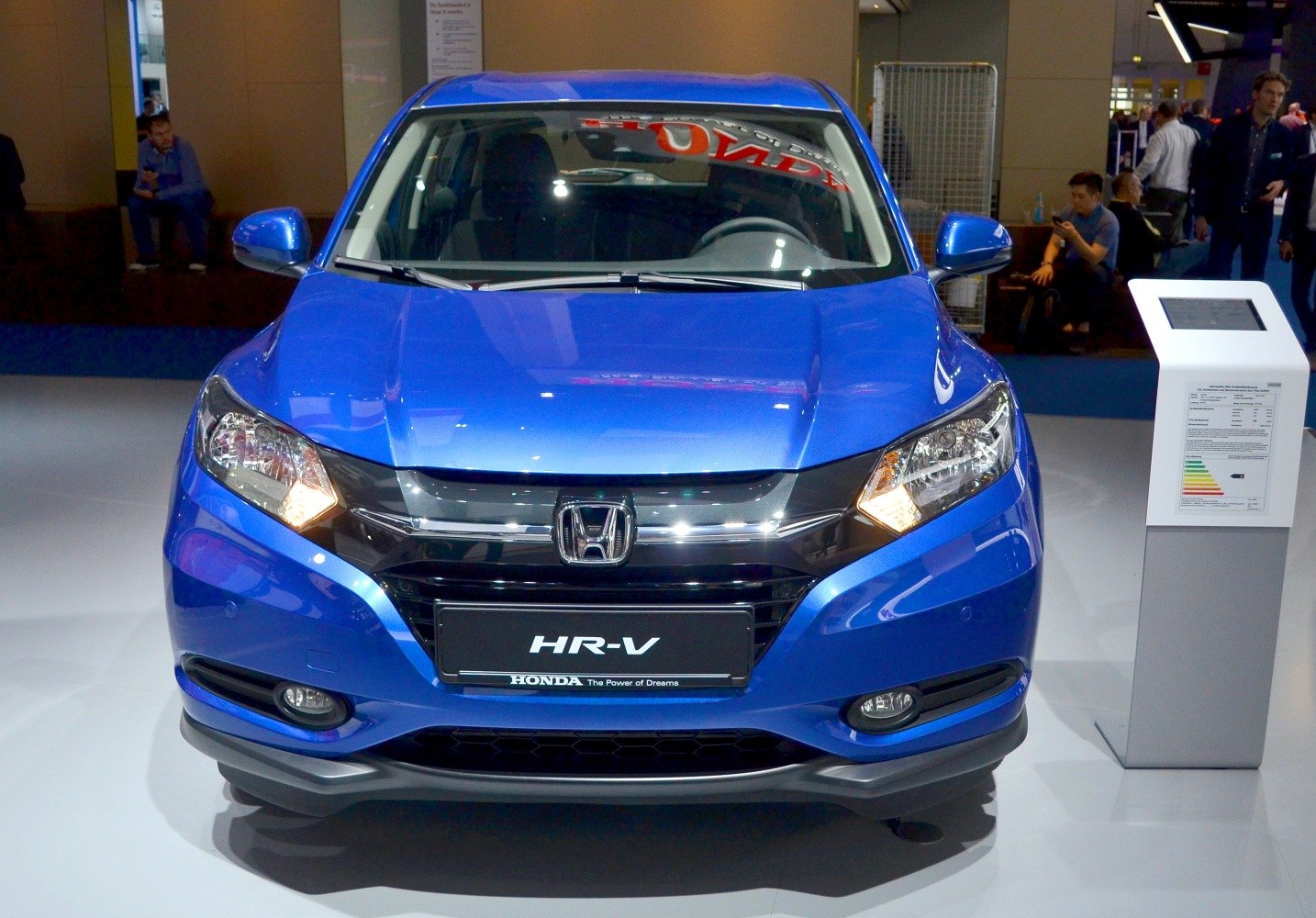 Front view with distinctive headlights and grille