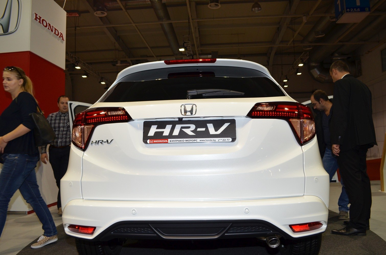 Rear view with LED tail lights, rear wiper, and clean bumper design