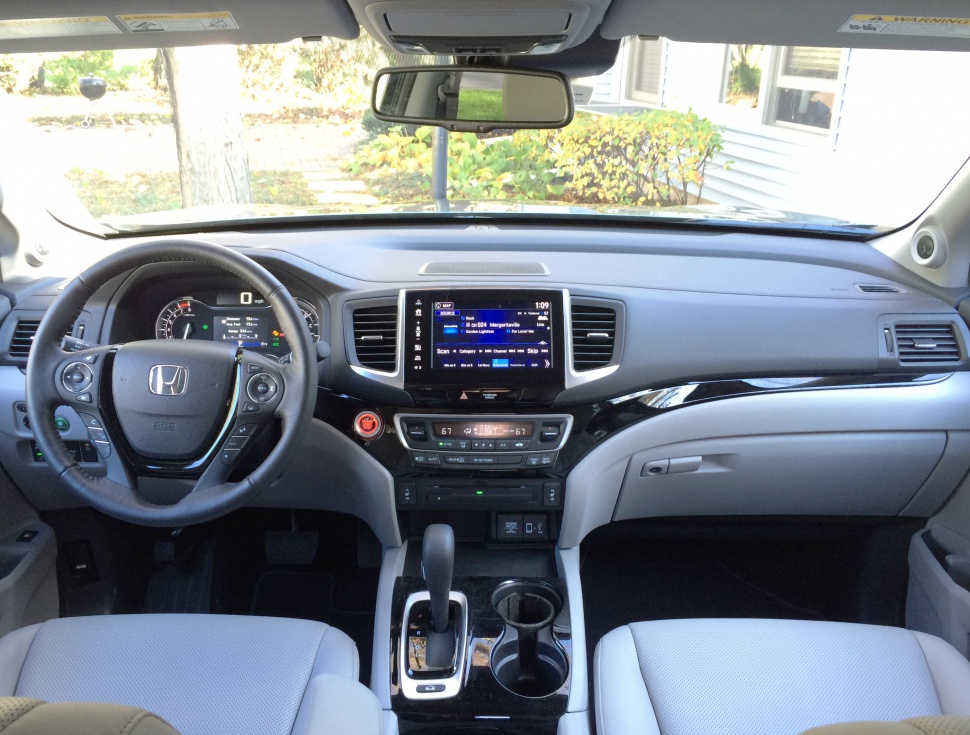 Dashboard, steering wheel, and center console of mid-size pickup truck interior