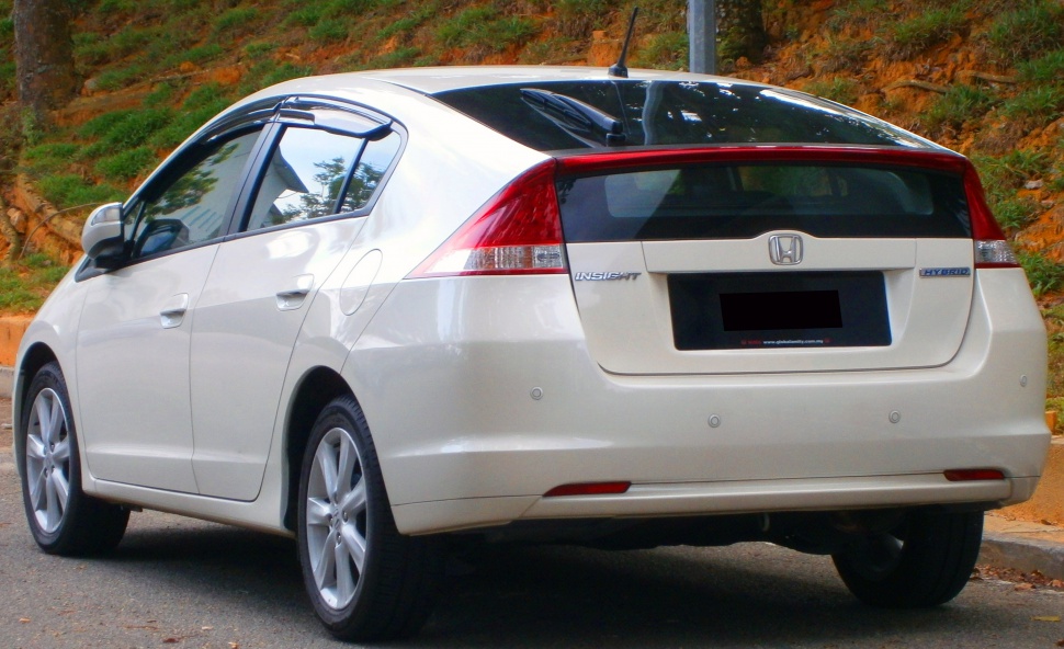 Rear view of a hybrid hatchback with distinctive taillights and sleek design