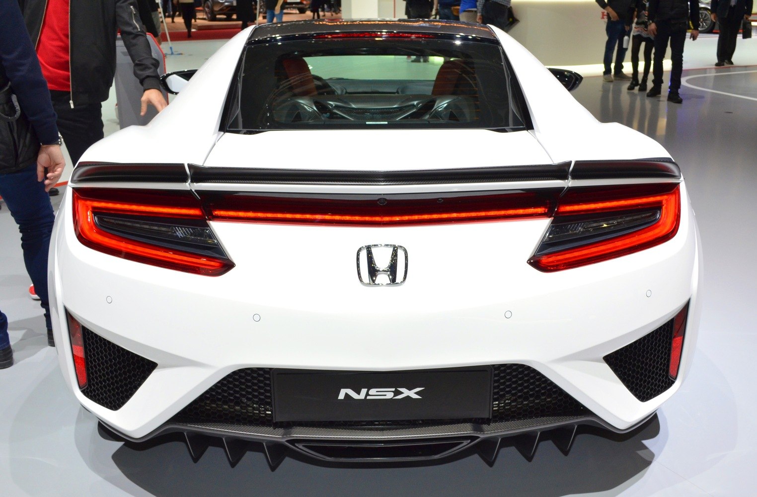LED taillights and carbon fiber rear diffuser of a modern sports car