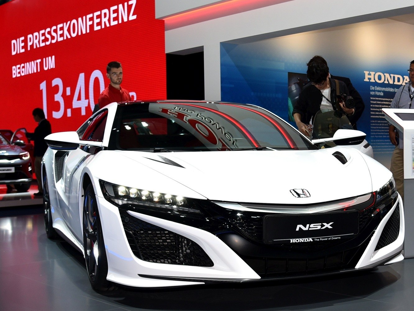 Sleek LED headlights and aerodynamic front design on sports coupe
