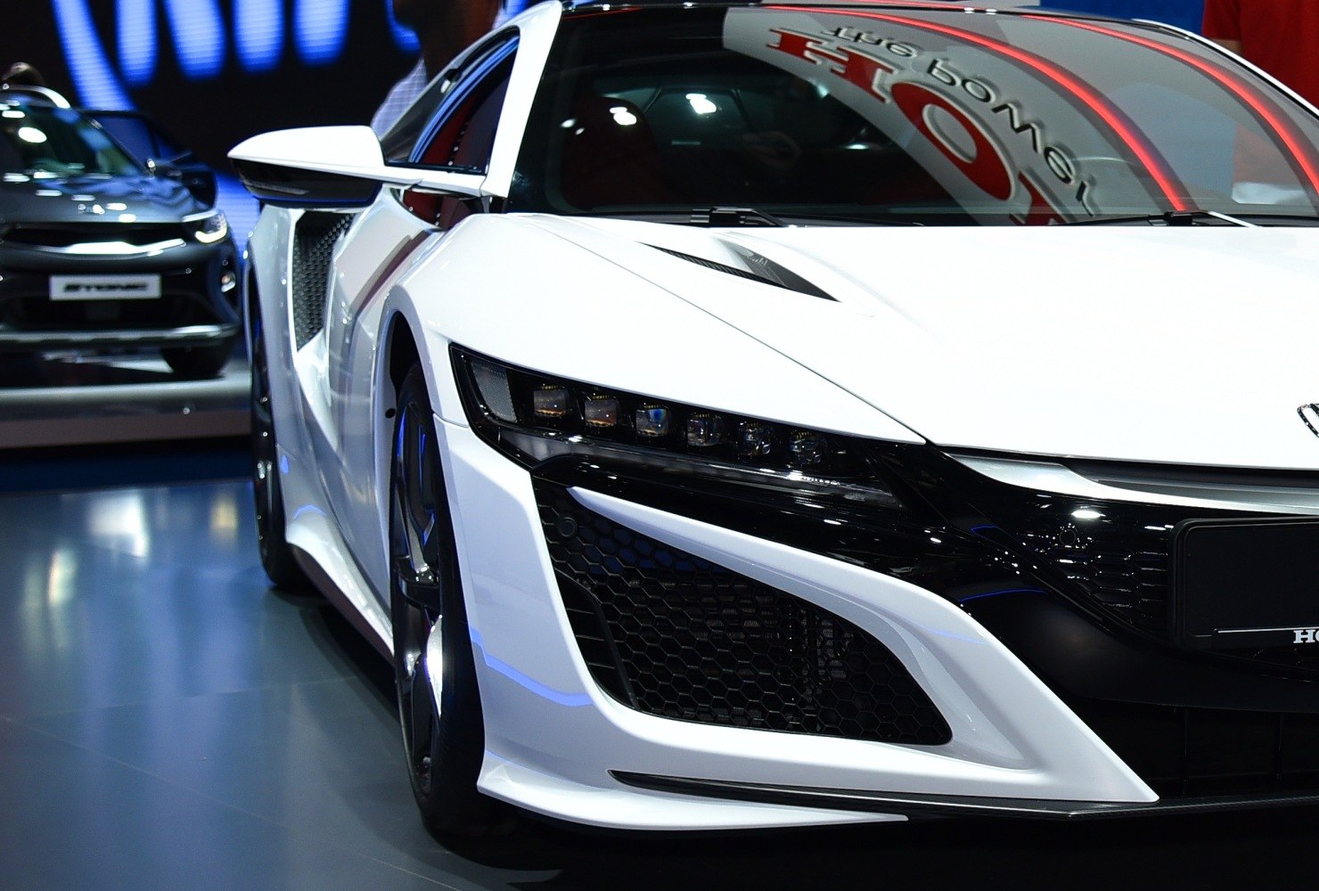 Close-up of aggressive front headlight and aerodynamic design
