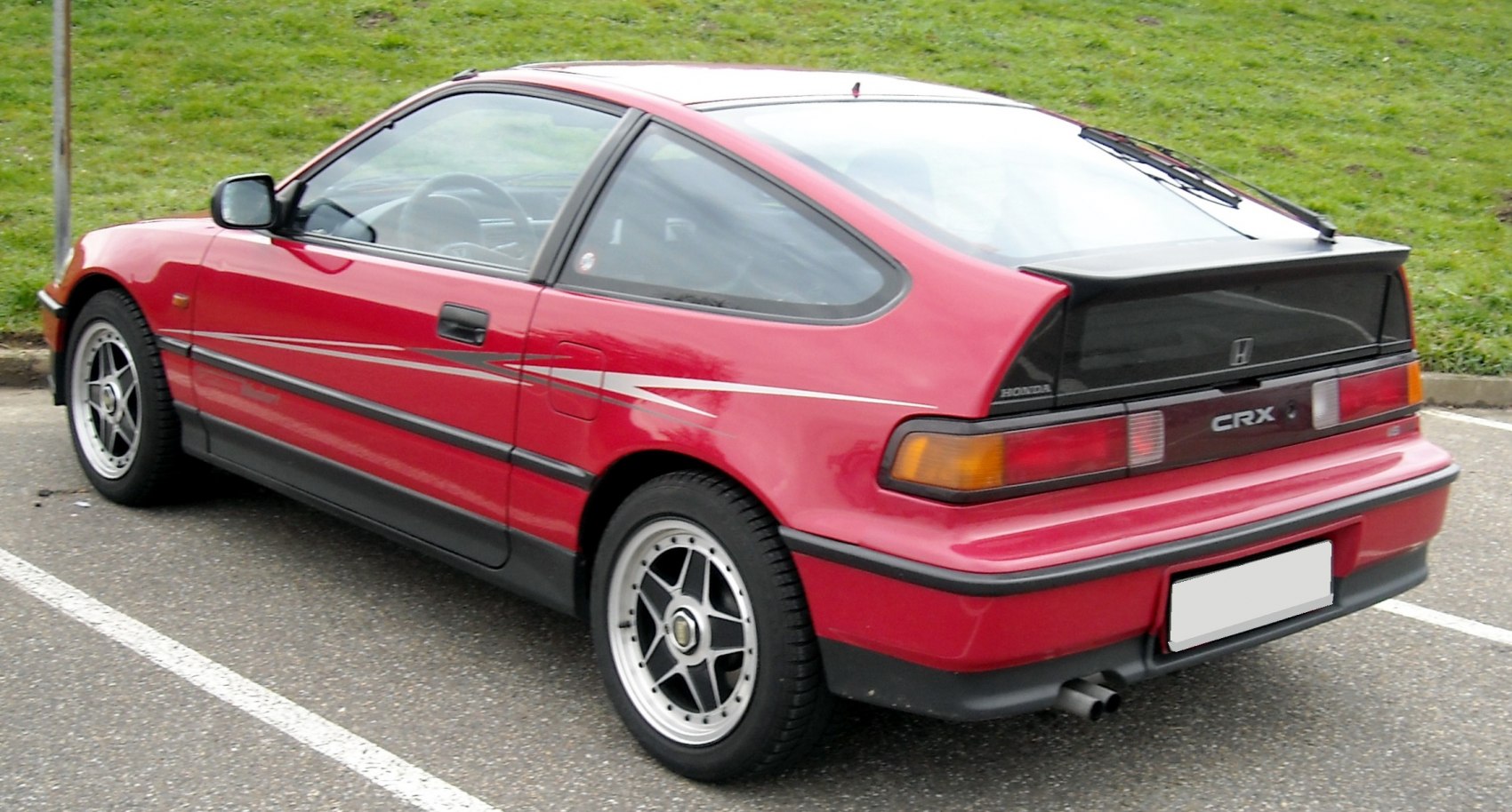 Rear view of a sporty 1980s two-door hatchback with alloy wheels