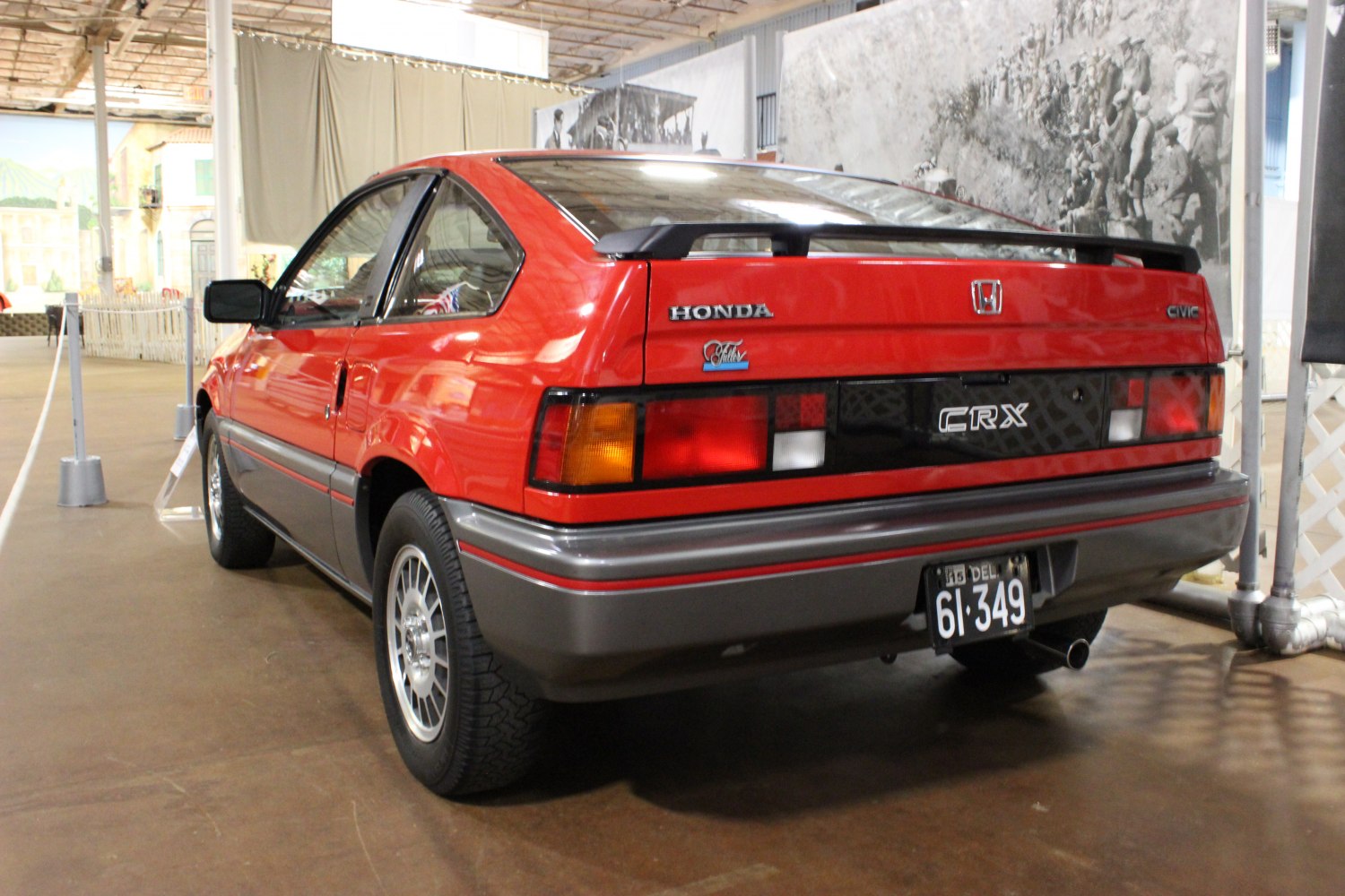 Rear view of hatchback with taillights and rear spoiler