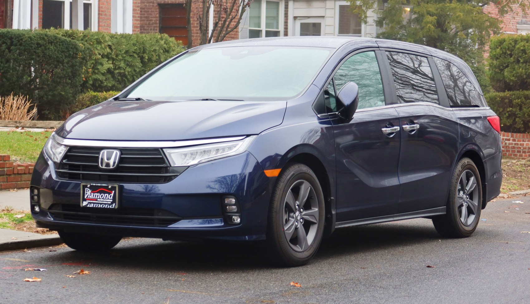 Sleek minivan front grille and side profile