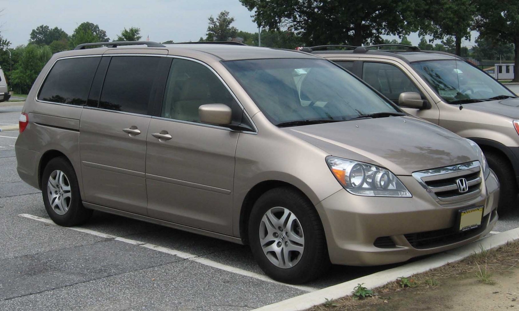 Minivan with sliding doors and roof rails