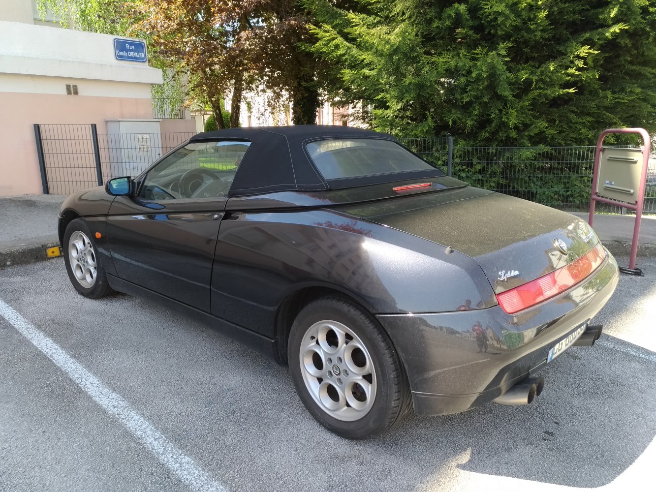 Convertible soft top with alloy wheels and dual exhaust