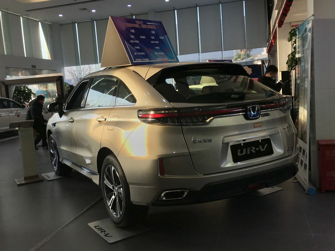 Facelift SUV rear with LED tail lights, dual exhaust tips, alloy wheels