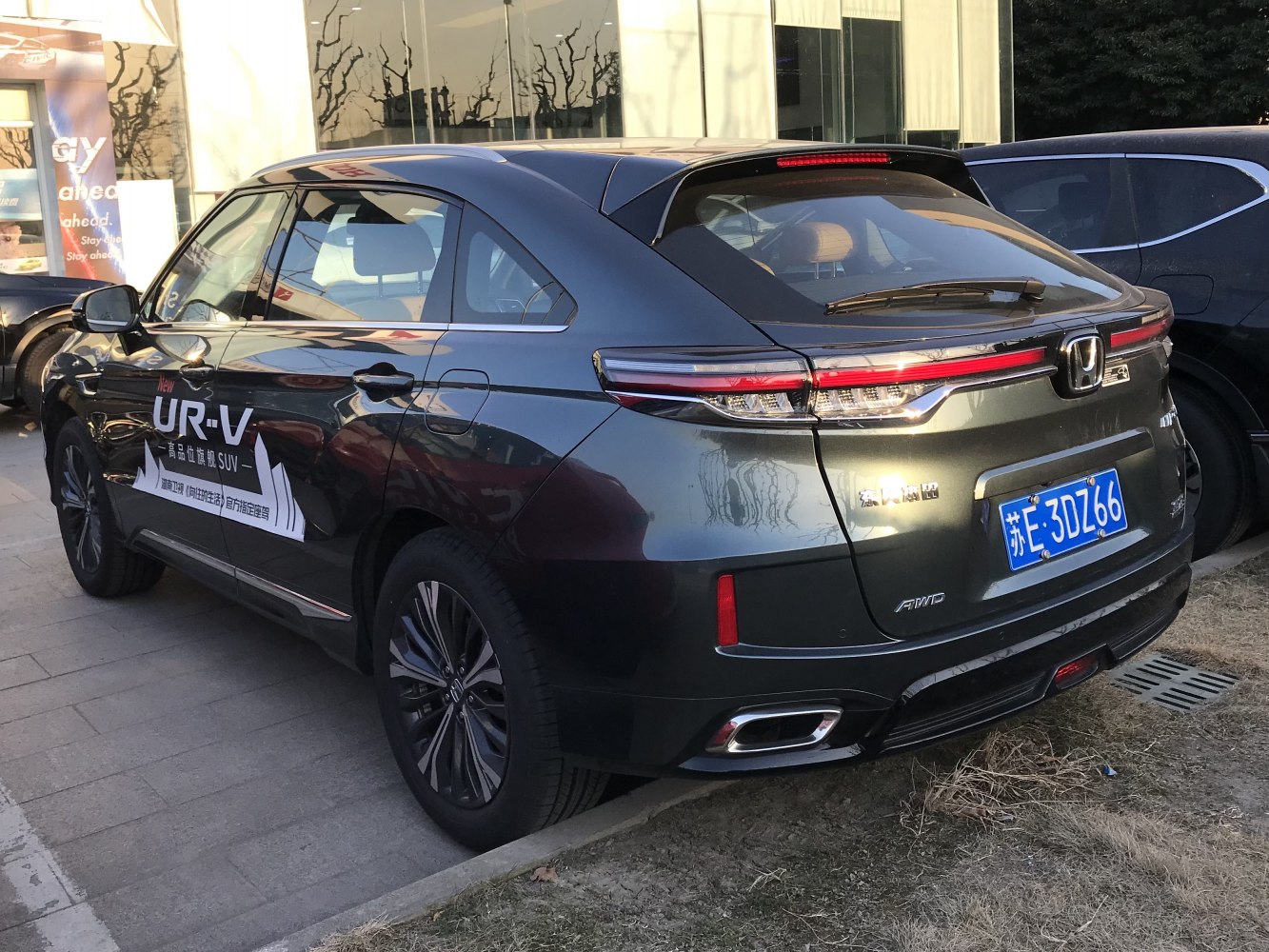 Rear and side view showing LED tail lights and dual exhausts