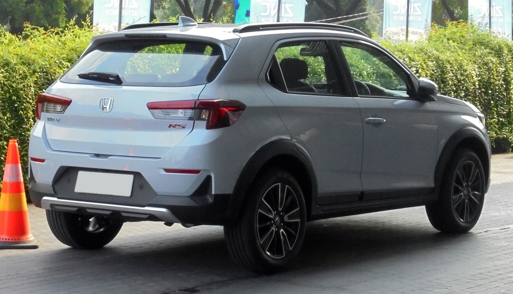 Rear view with distinct tail lights and bold wheel arches