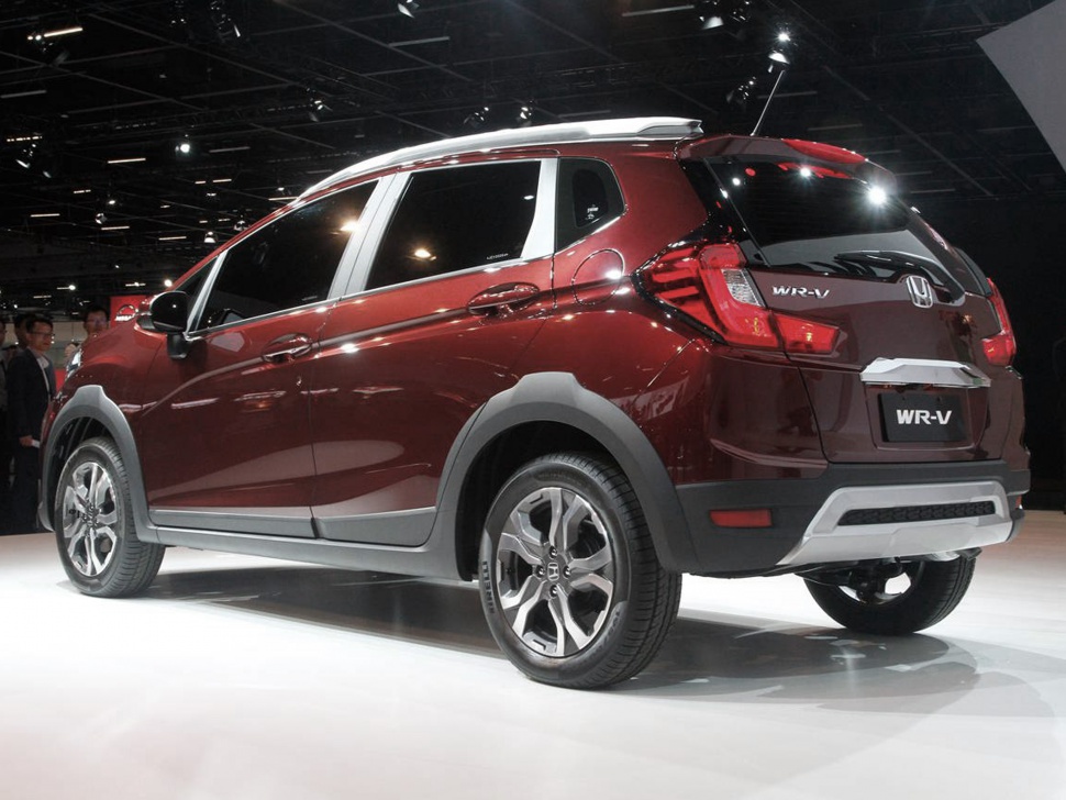 Compact SUV rear three-quarter view with taillights and alloy wheels