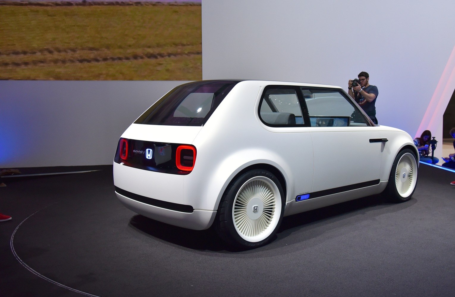 Rear view with futuristic LED taillights and aerodynamic wheels