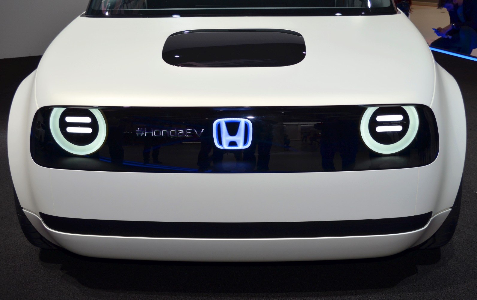 Distinctive circular LED headlights and illuminated emblem on front fascia