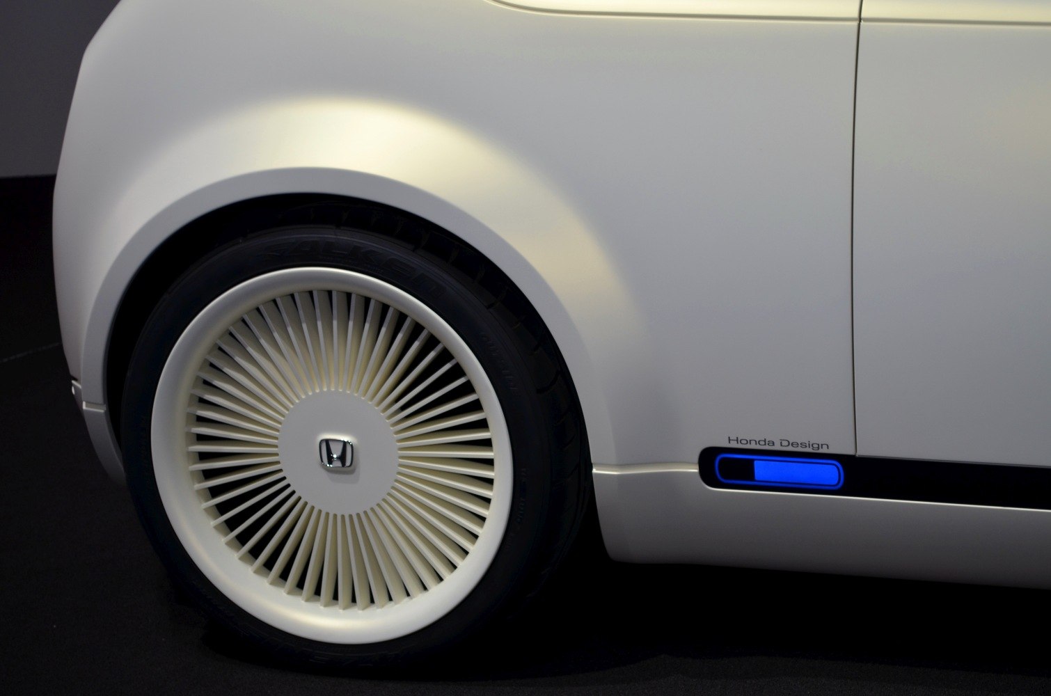 Futuristic multi-spoke wheel and blue LED accent