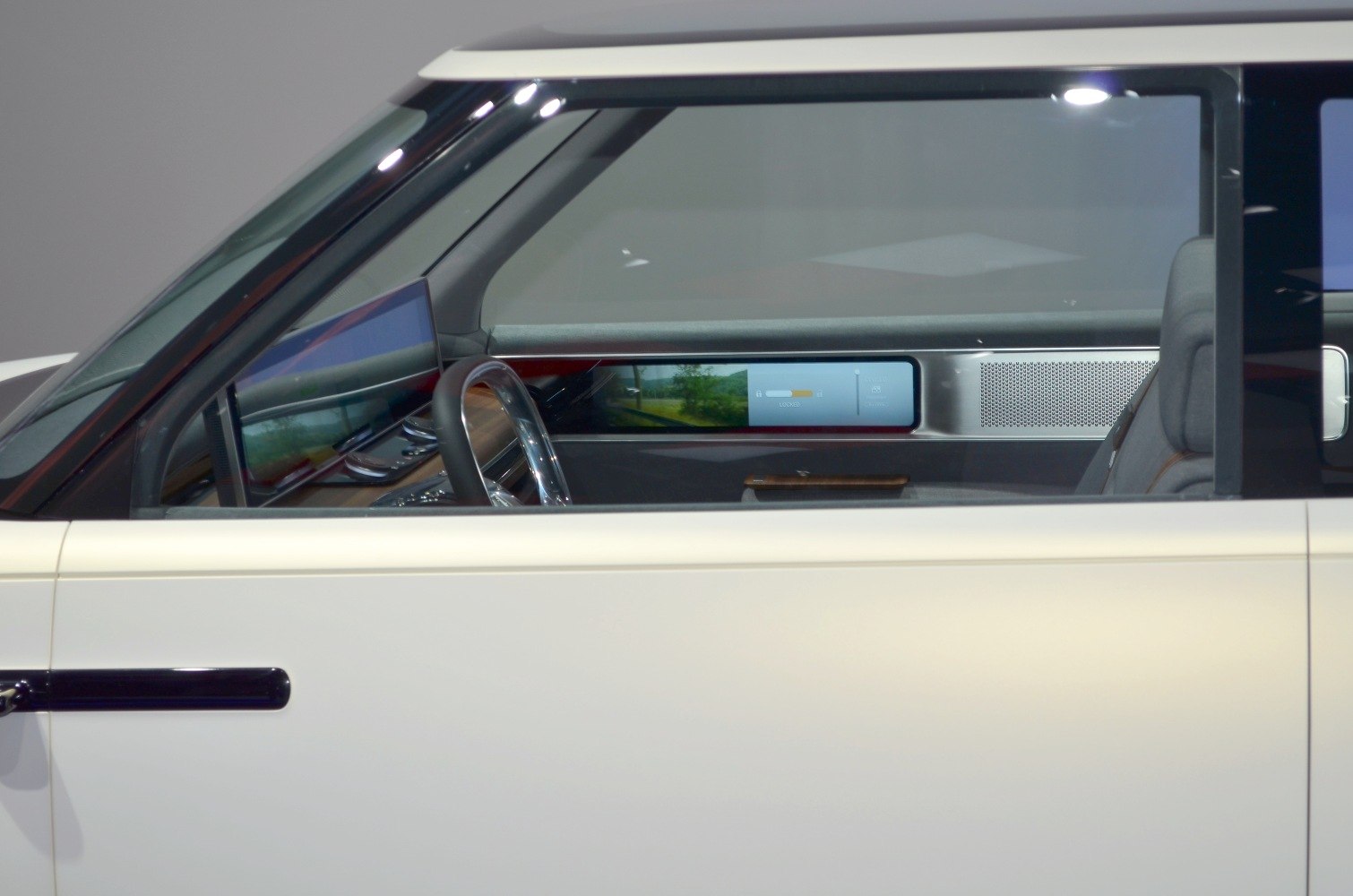 Futuristic interior with digital display and modern steering wheel