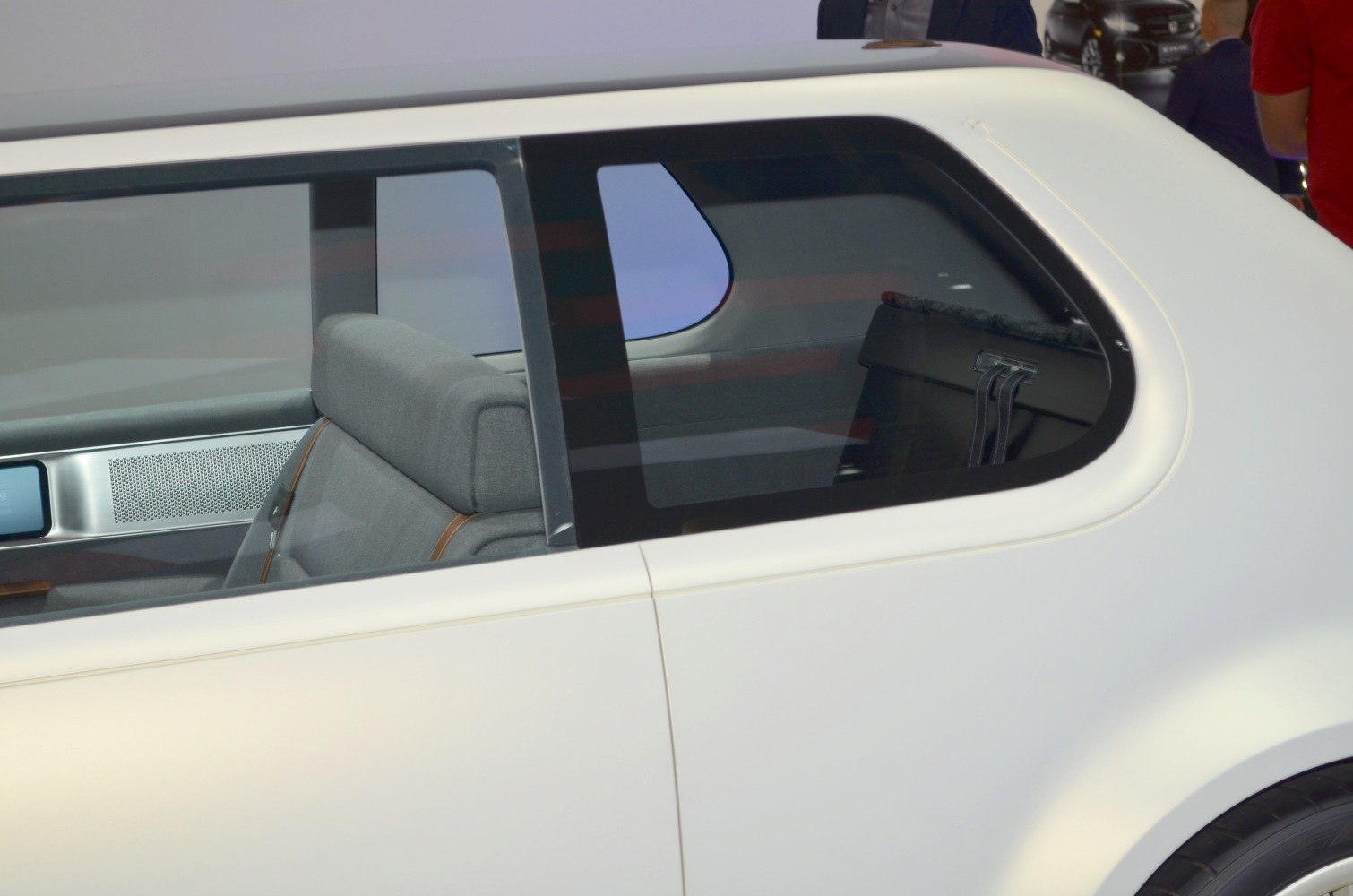 Close-up of rear side window and modern interior seating