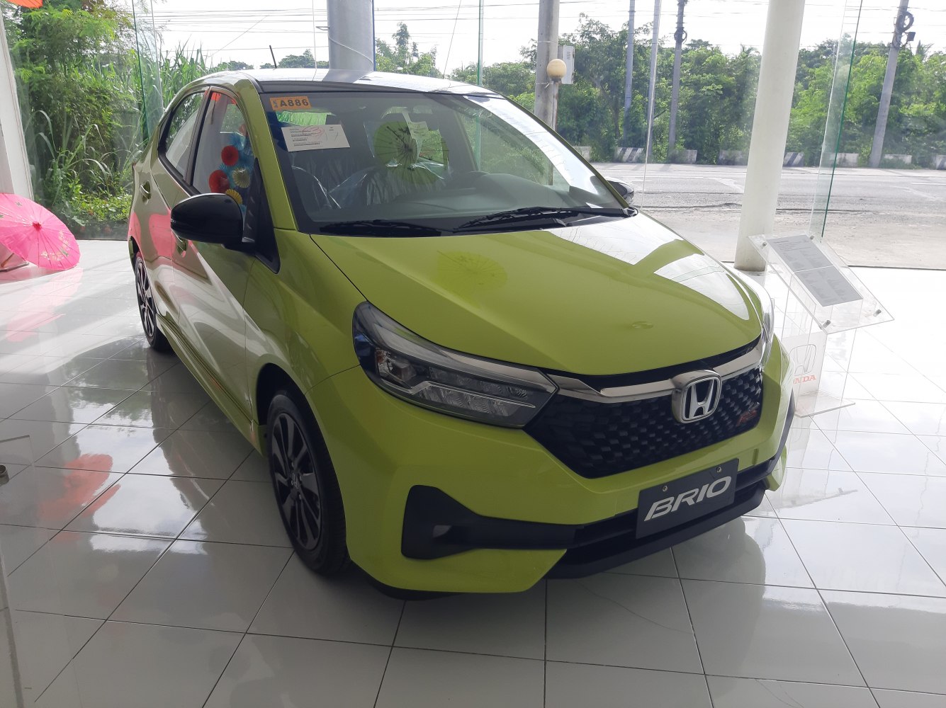 front grille and sleek headlights of a compact hatchback