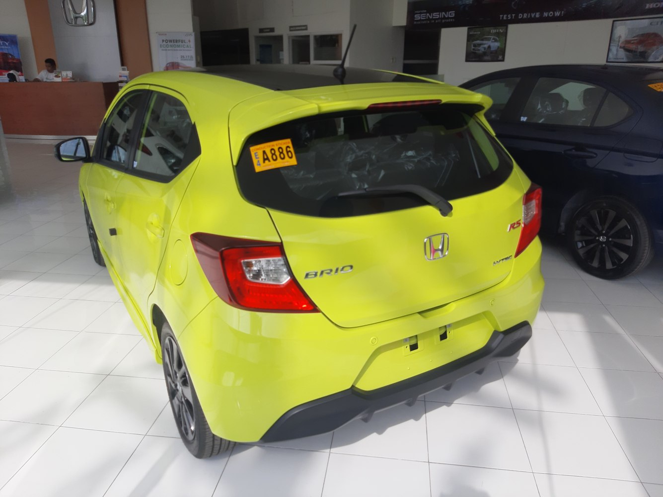 Rear view of compact hatchback with RS badge and rear wiper