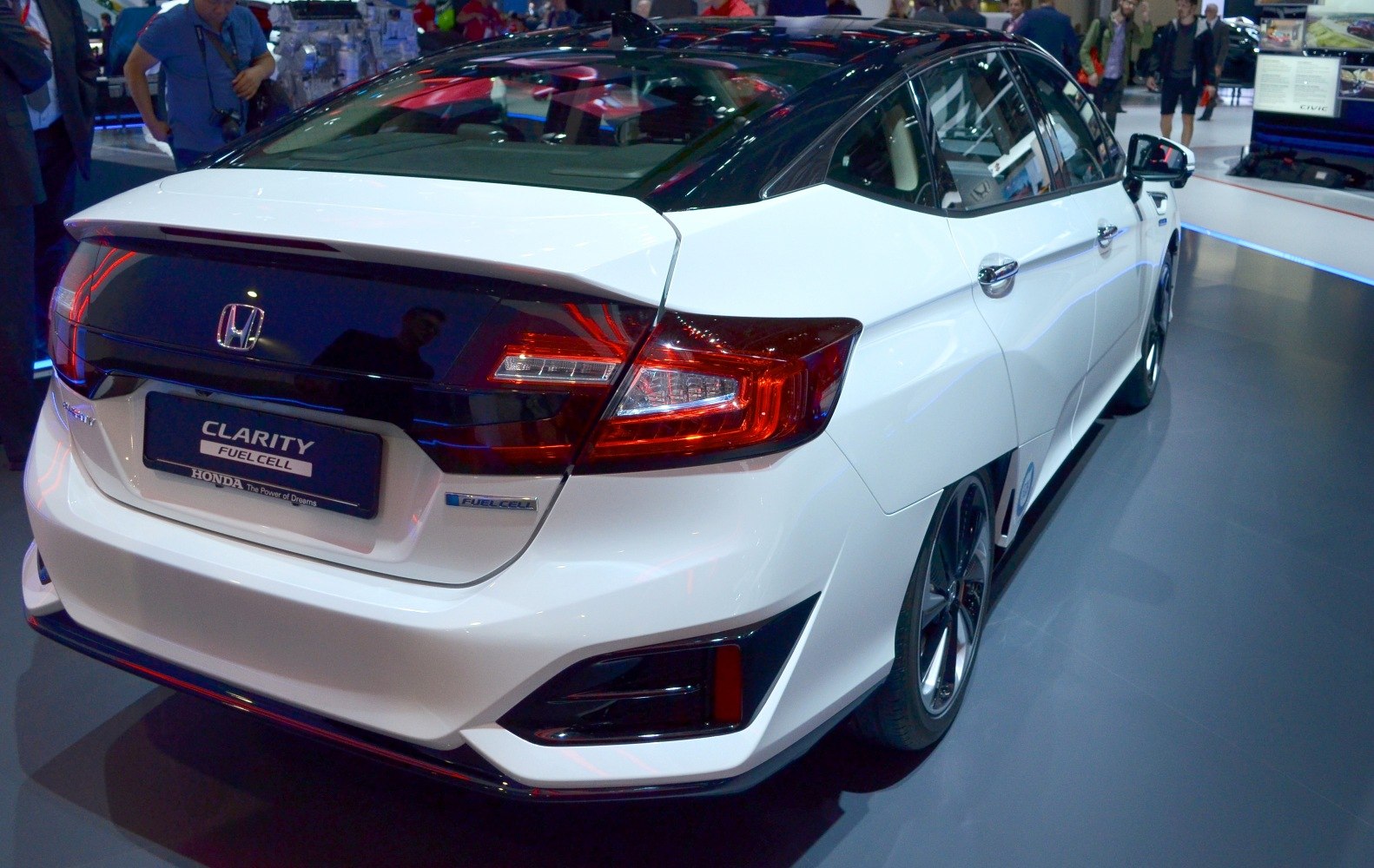 Rear view of hatchback with distinctive tail lights and aerodynamic design