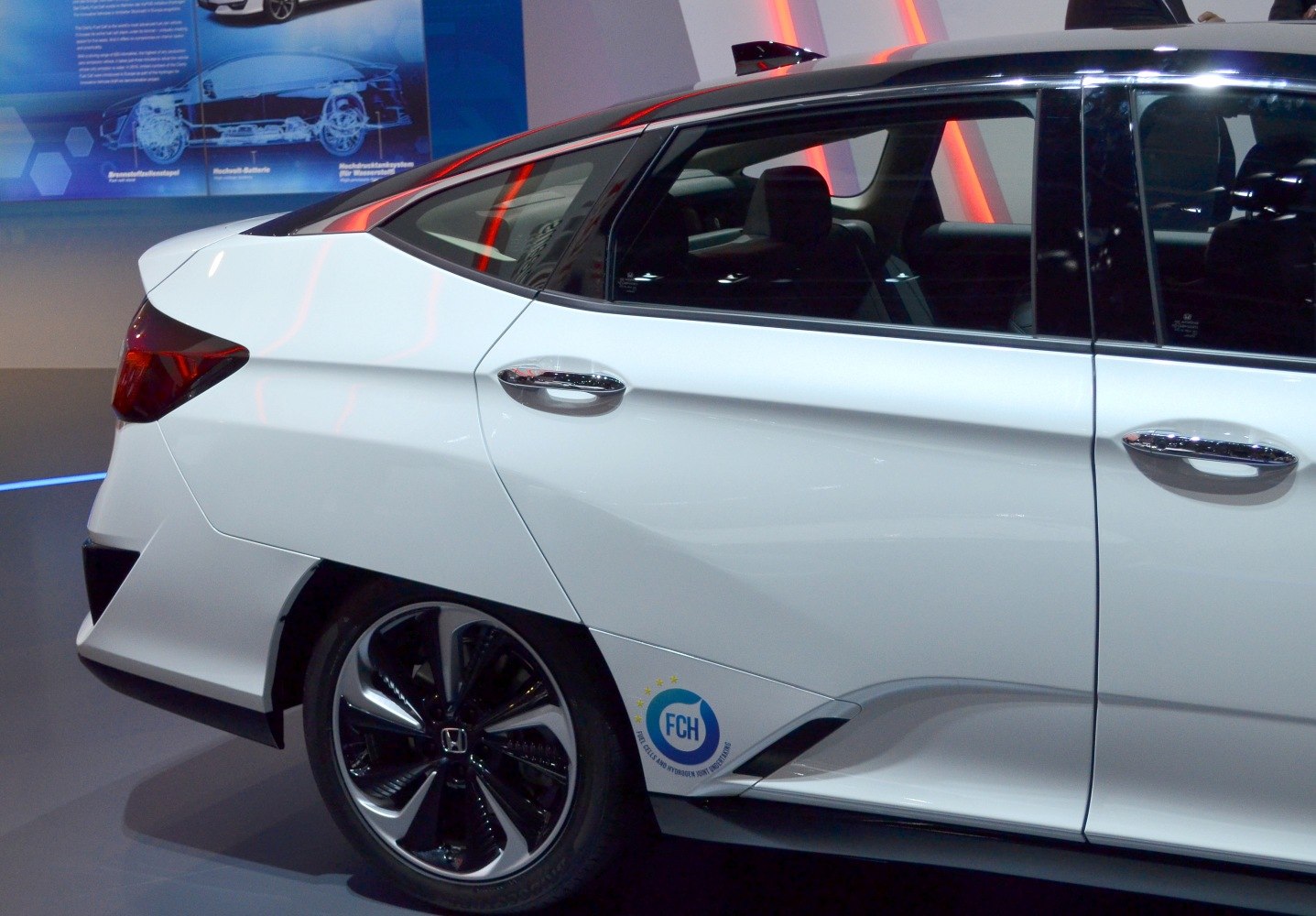 Angular rear side design with aerodynamic alloy wheel