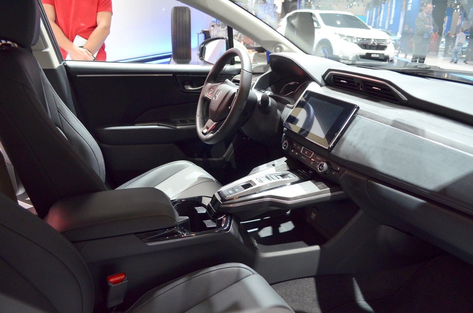 Modern digital dashboard and central touchscreen display with ergonomic seating