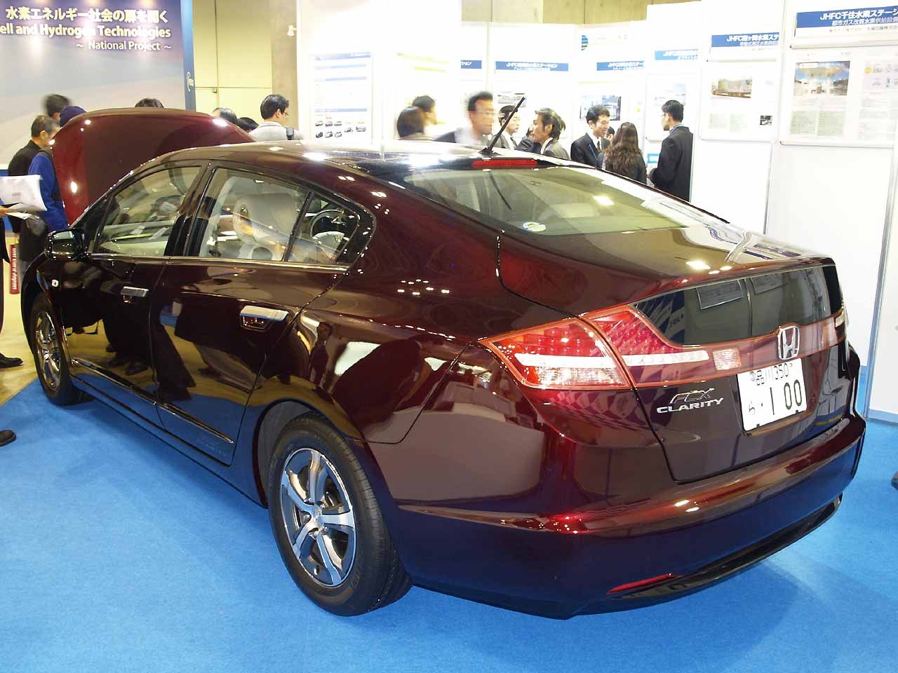Rear view of a hydrogen fuel cell sedan with sleek design and distinctive taillights.