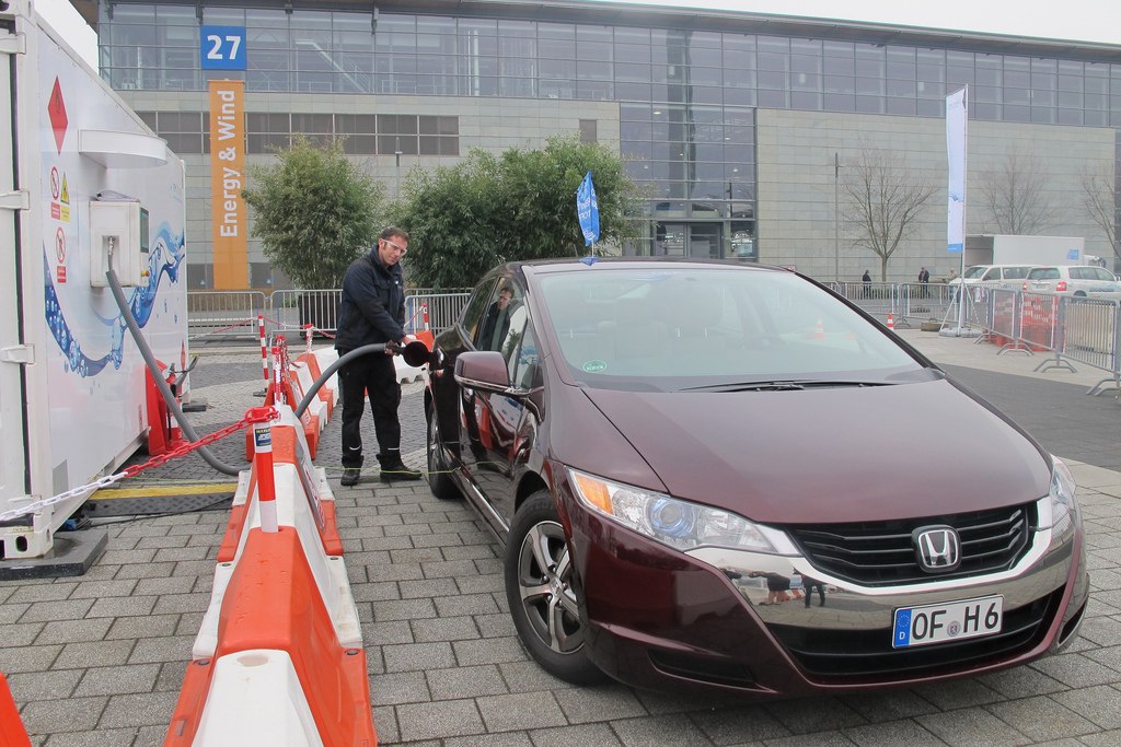 Hydrogen refueling and front exterior with unique grille and headlights.