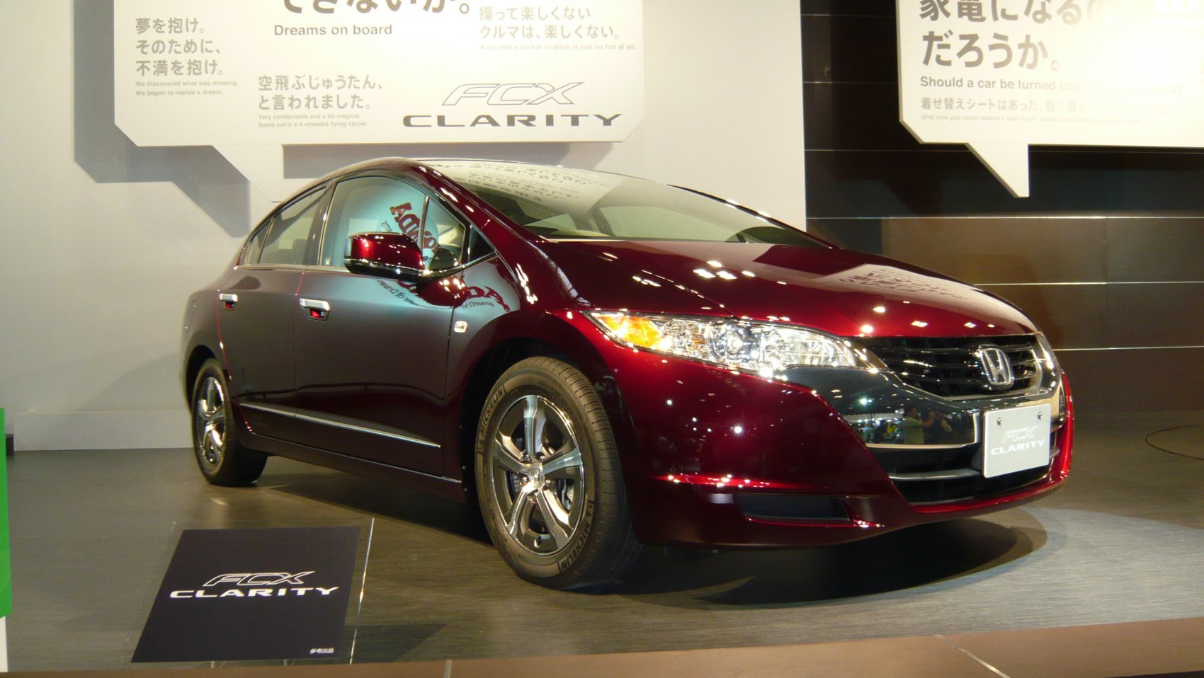 Hydrogen fuel cell luxury sedan with sleek design and alloy wheels