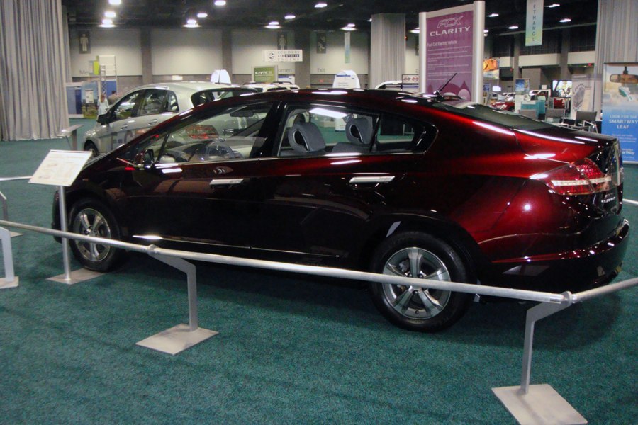 Sleek side profile with aerodynamic design and electric sedan features