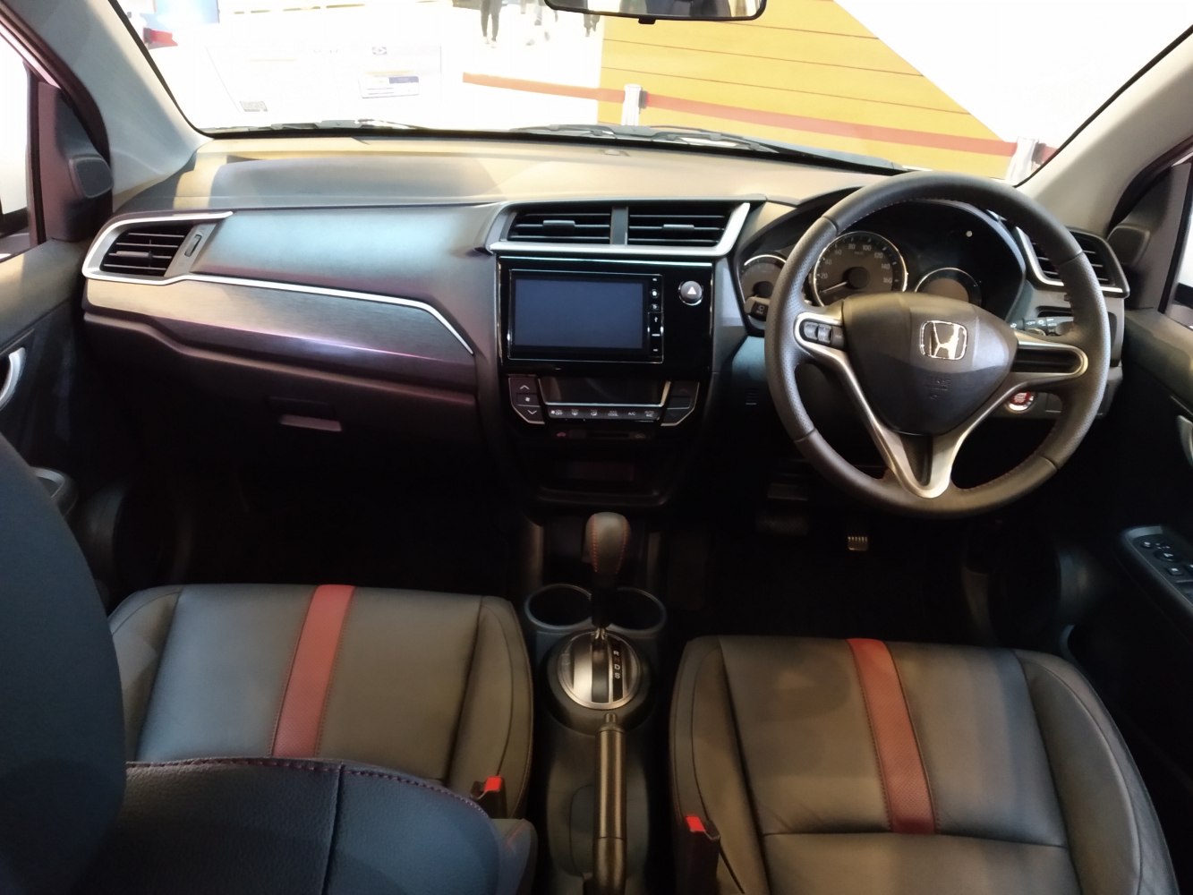 Interior dashboard and steering wheel with dual-tone seats