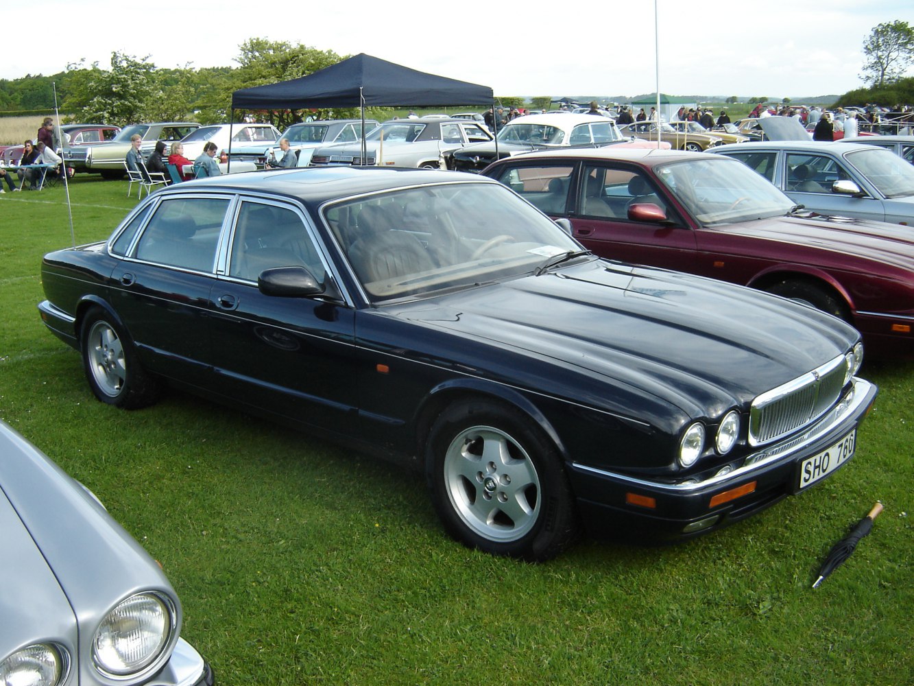Classic sedan with quad round headlights and alloy wheels
