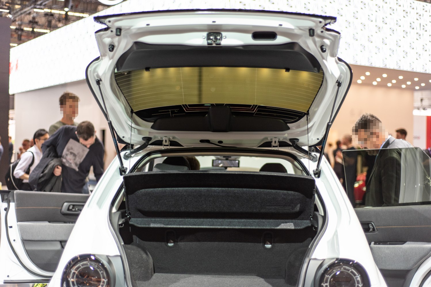 Open rear hatch showing hatchback trunk space and interior