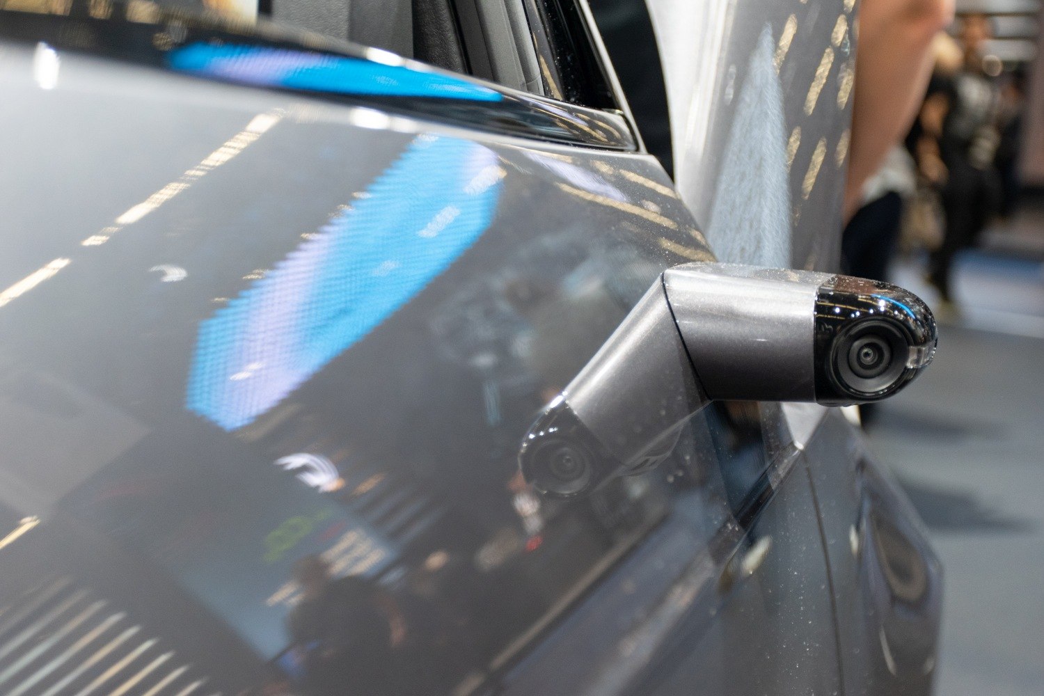 Close-up of a Honda e generation digital side mirror camera