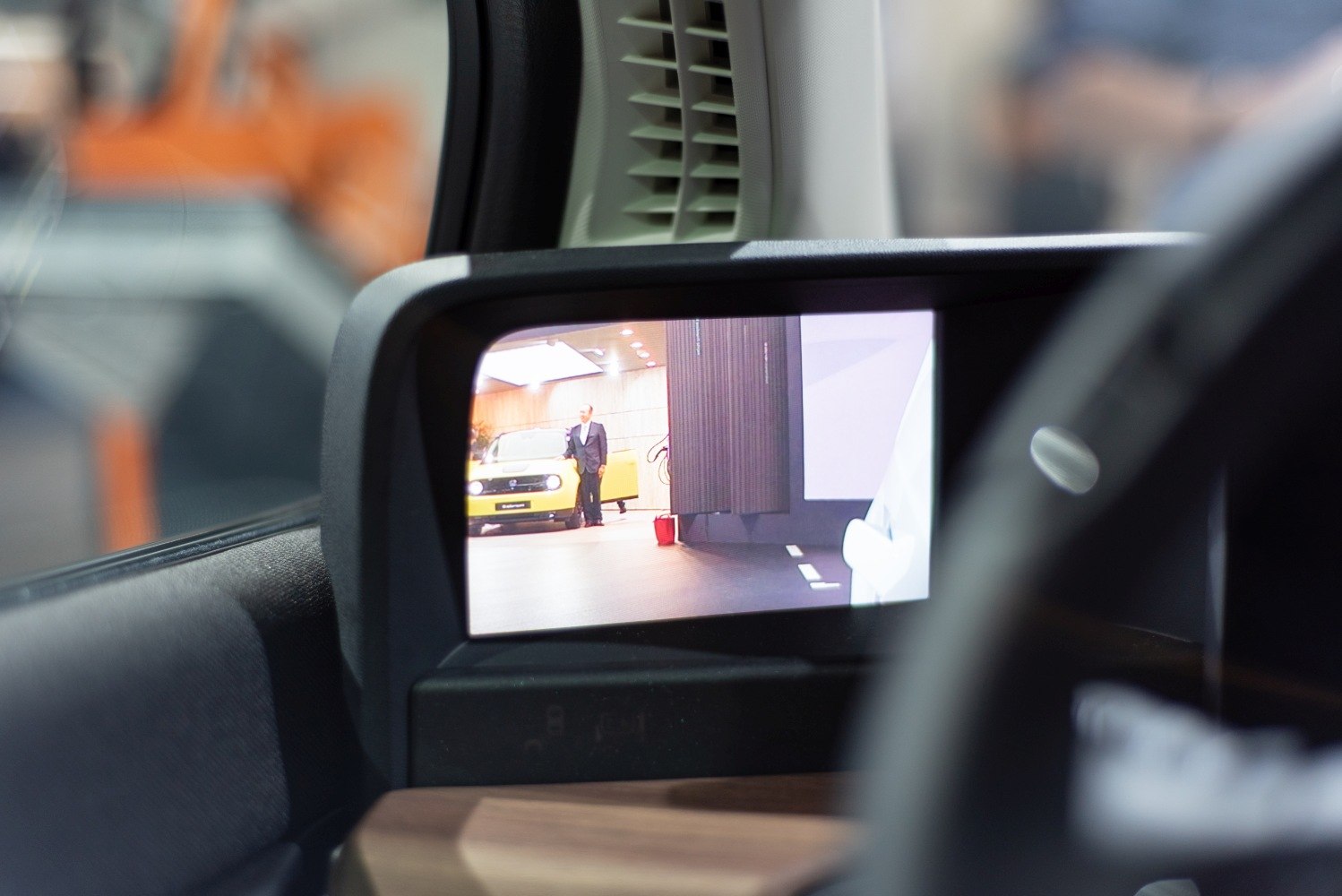 Digital side mirror display showing exterior side view camera feed