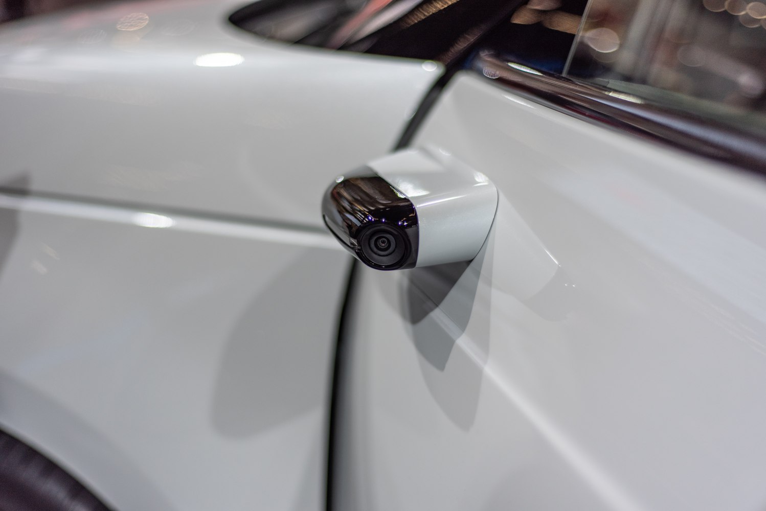 Close-up of a modern side camera replacing traditional side mirror