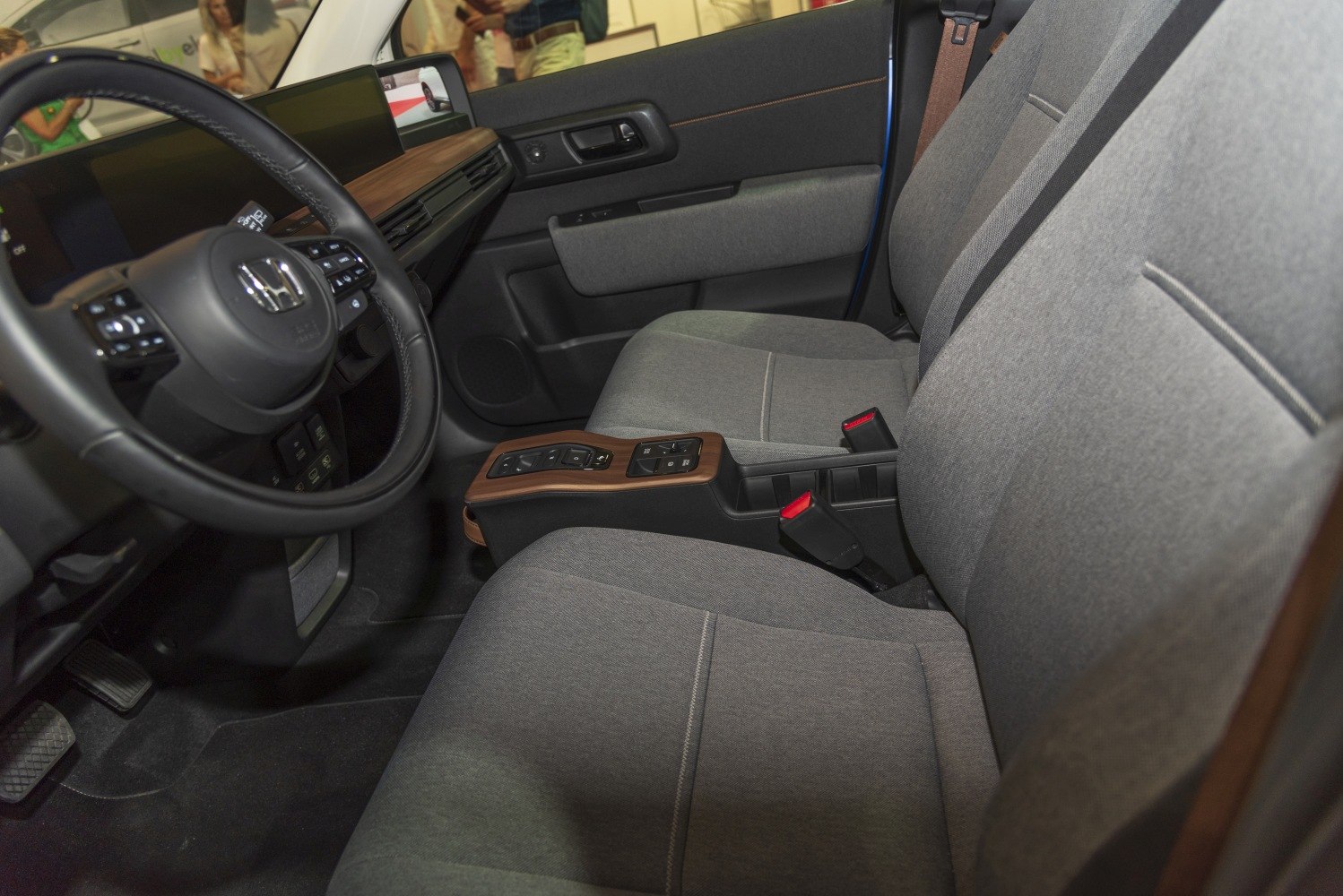 Modern dashboard, digital displays, fabric seats interior