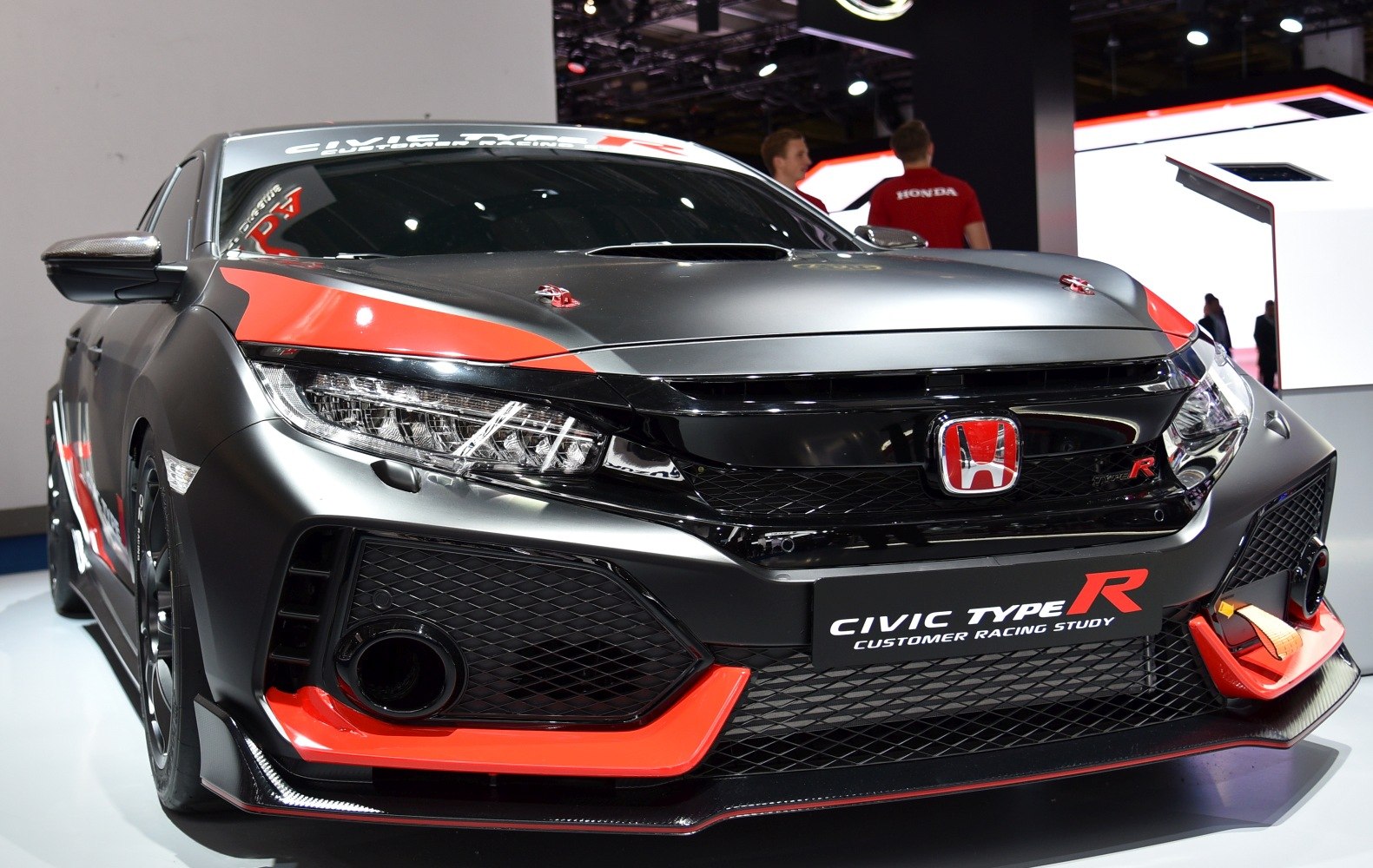 Front racing end with aggressive aerodynamic features and red accent details
